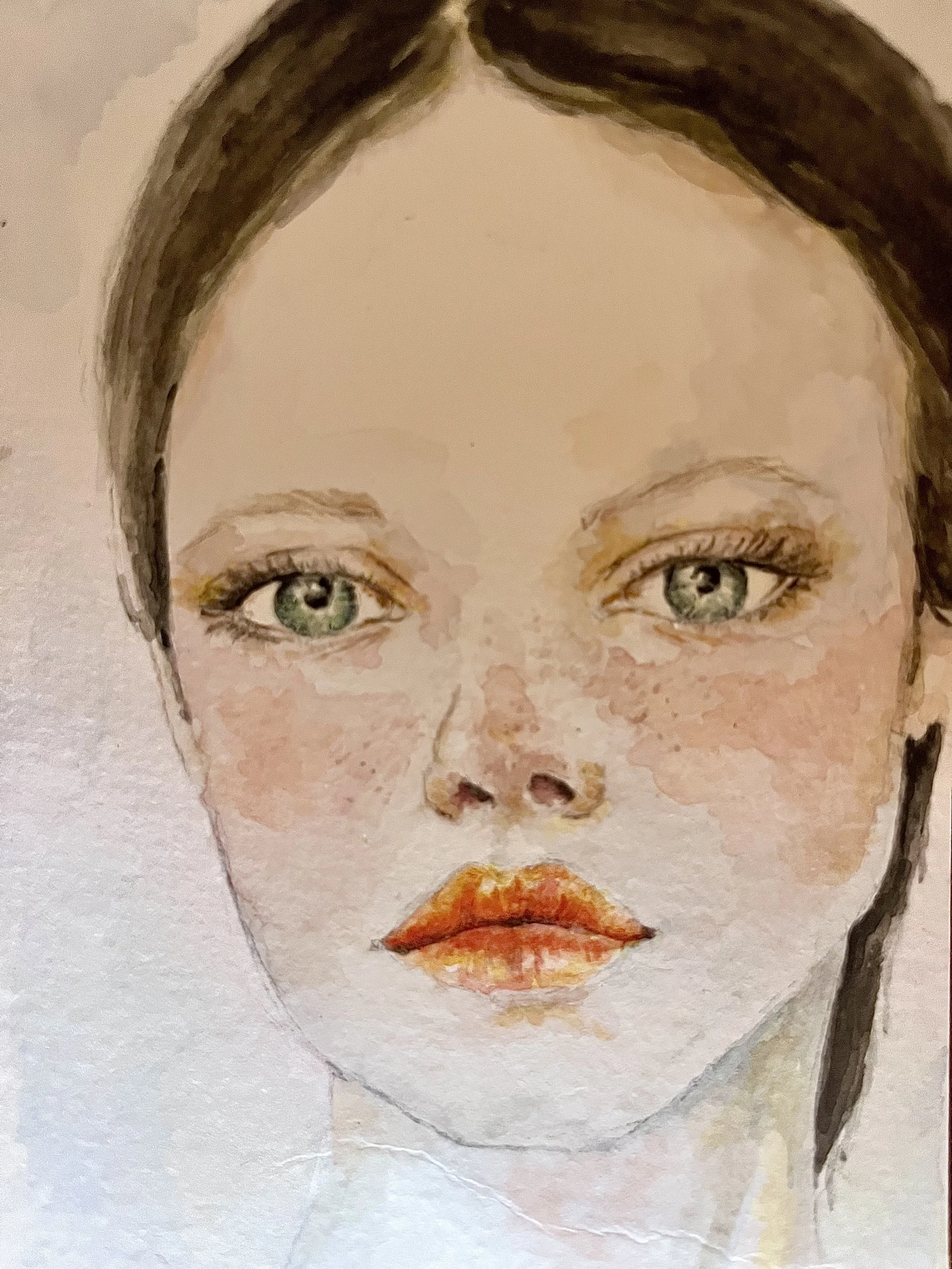 A watercolor illustration of a woman's face, with green eyes, red lips, and dark brown hair.