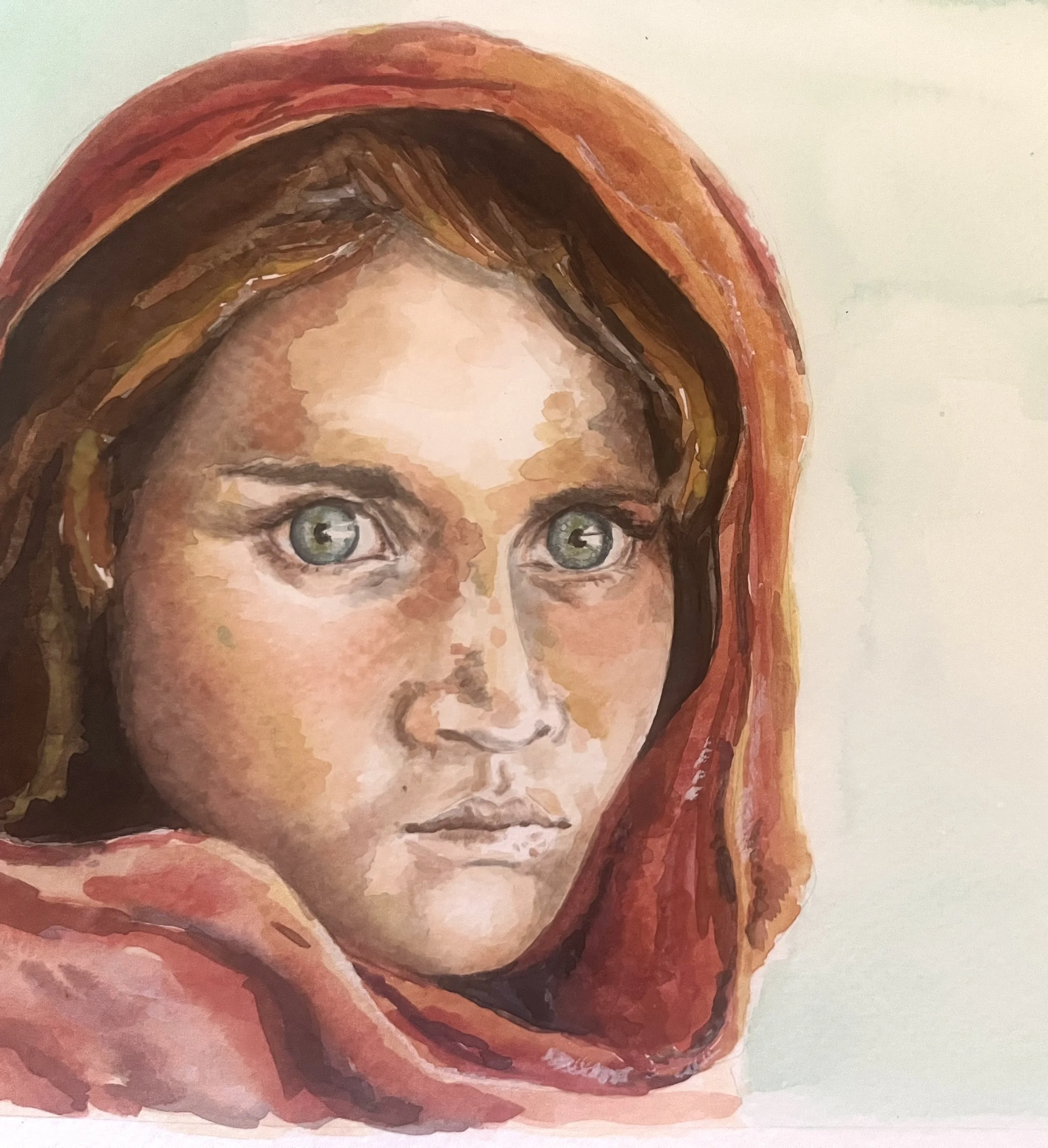 Close-up of a woman's face with striking blue eyes and brown hair with scarf around her head, painted in a watercolor style.