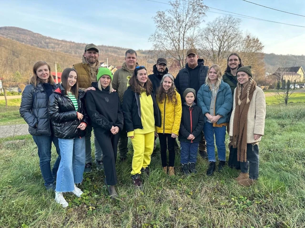 UA Ants team members gathered outdoors in Ukraine, serving families through US Ants–supported humanitarian and rehabilitation programs.