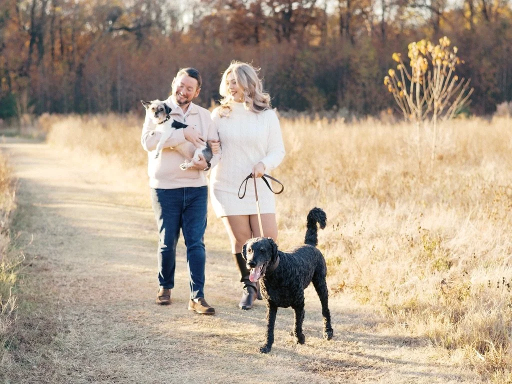 Austin and Morgan walking with Beau and Gracie Ann