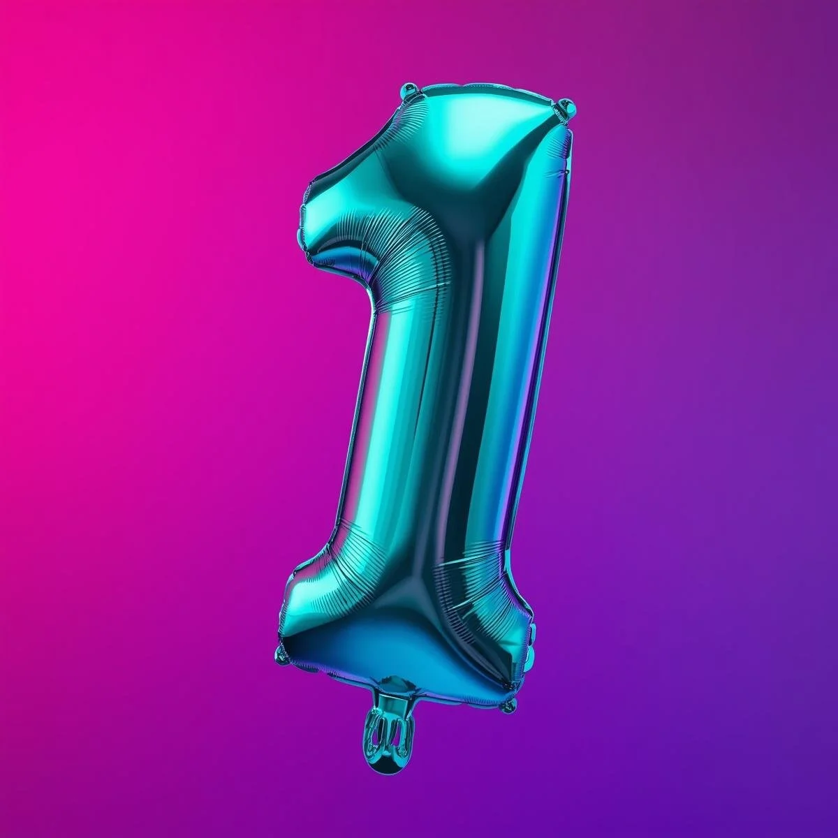 number one balloon in teal on a bright pink and purple background.jpg