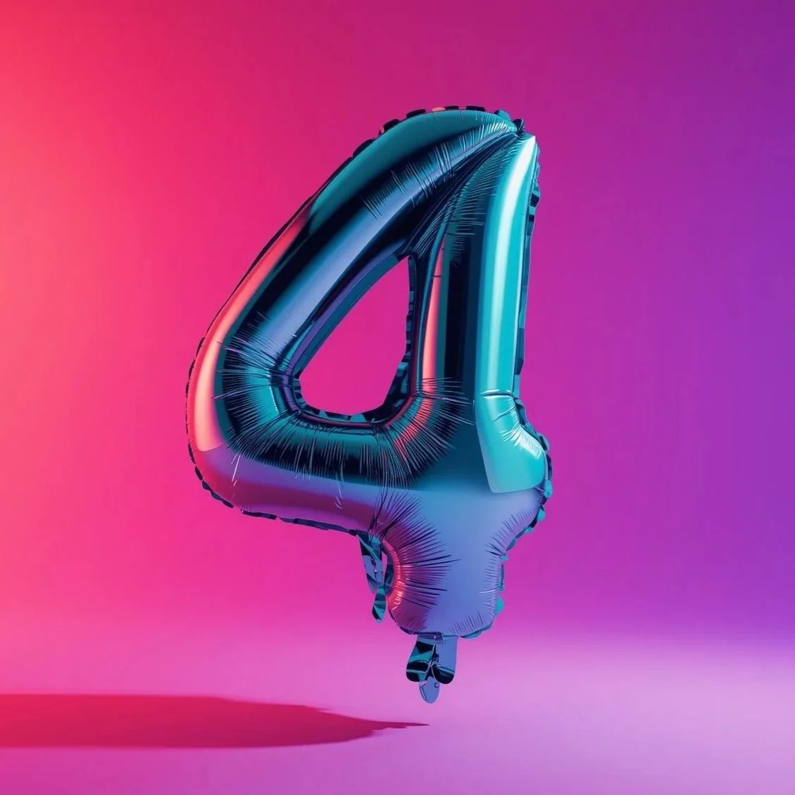 number+4+balloon+in+teal+on+a+bright+pink+and+purple+gradient+background.jpg