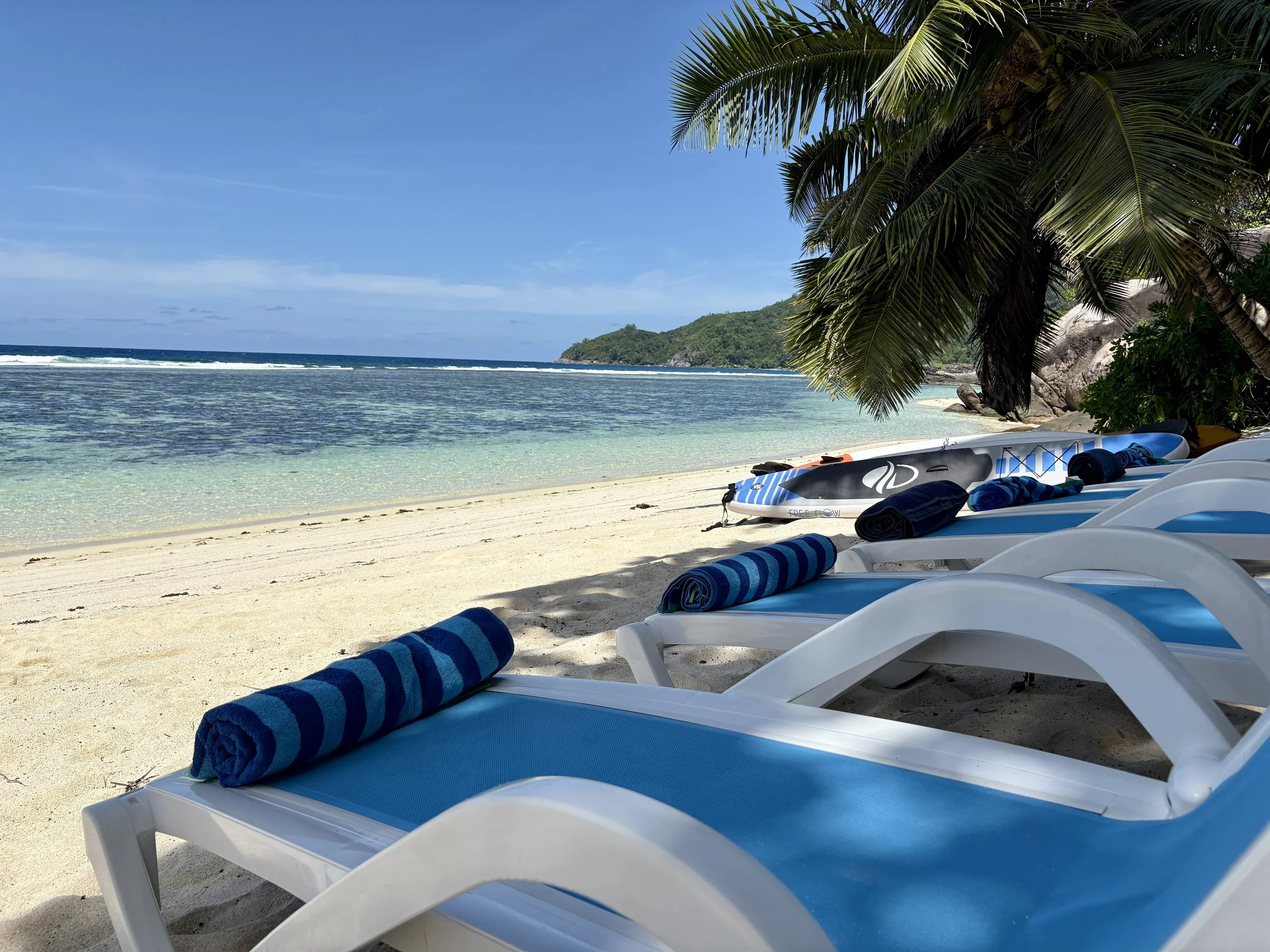 sun loungers and SUPs VIP beach experience.JPG