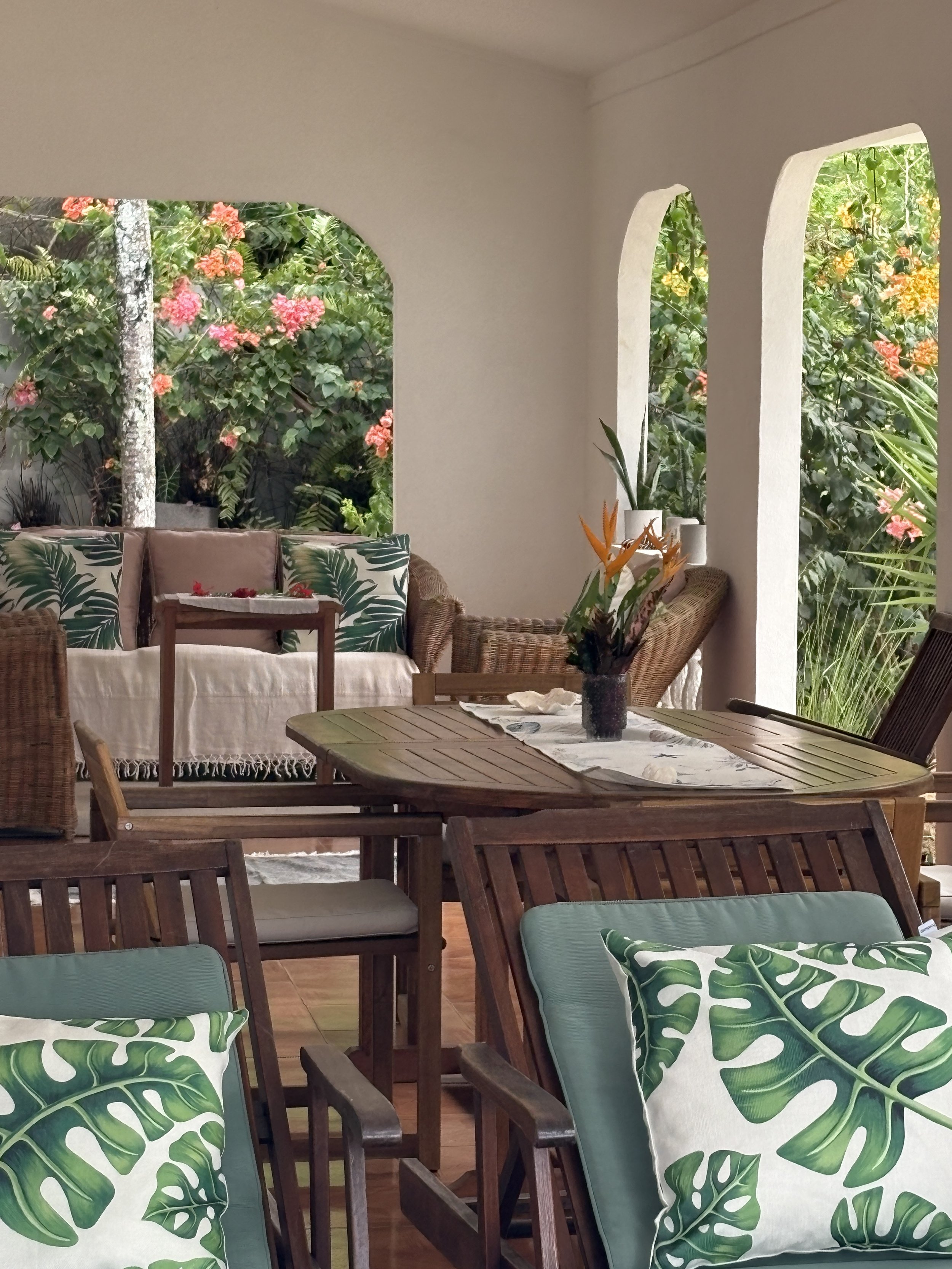 view of deck loungers dining table couch.JPG