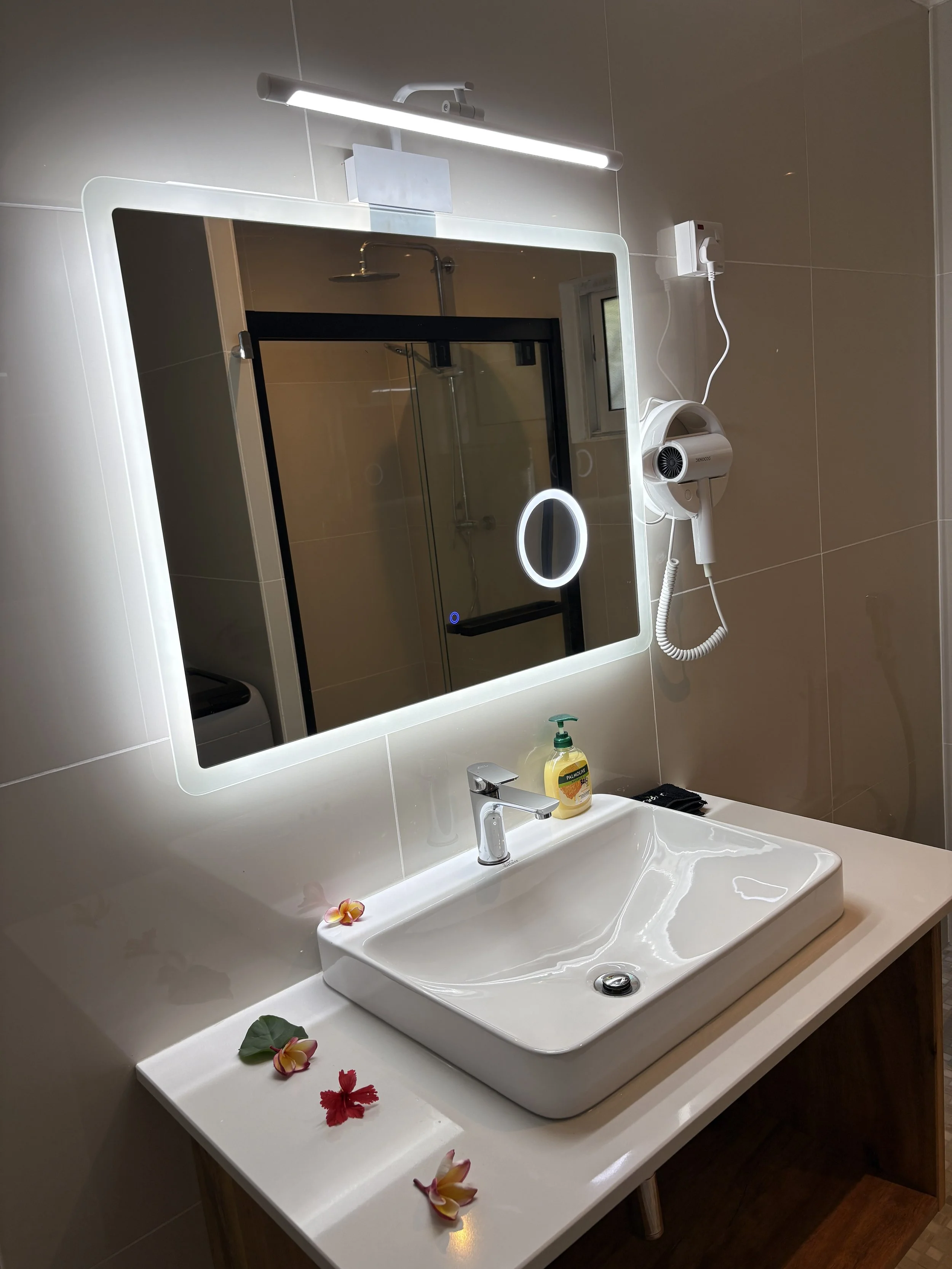 newly renovated bathroom with tropical flowers.JPG