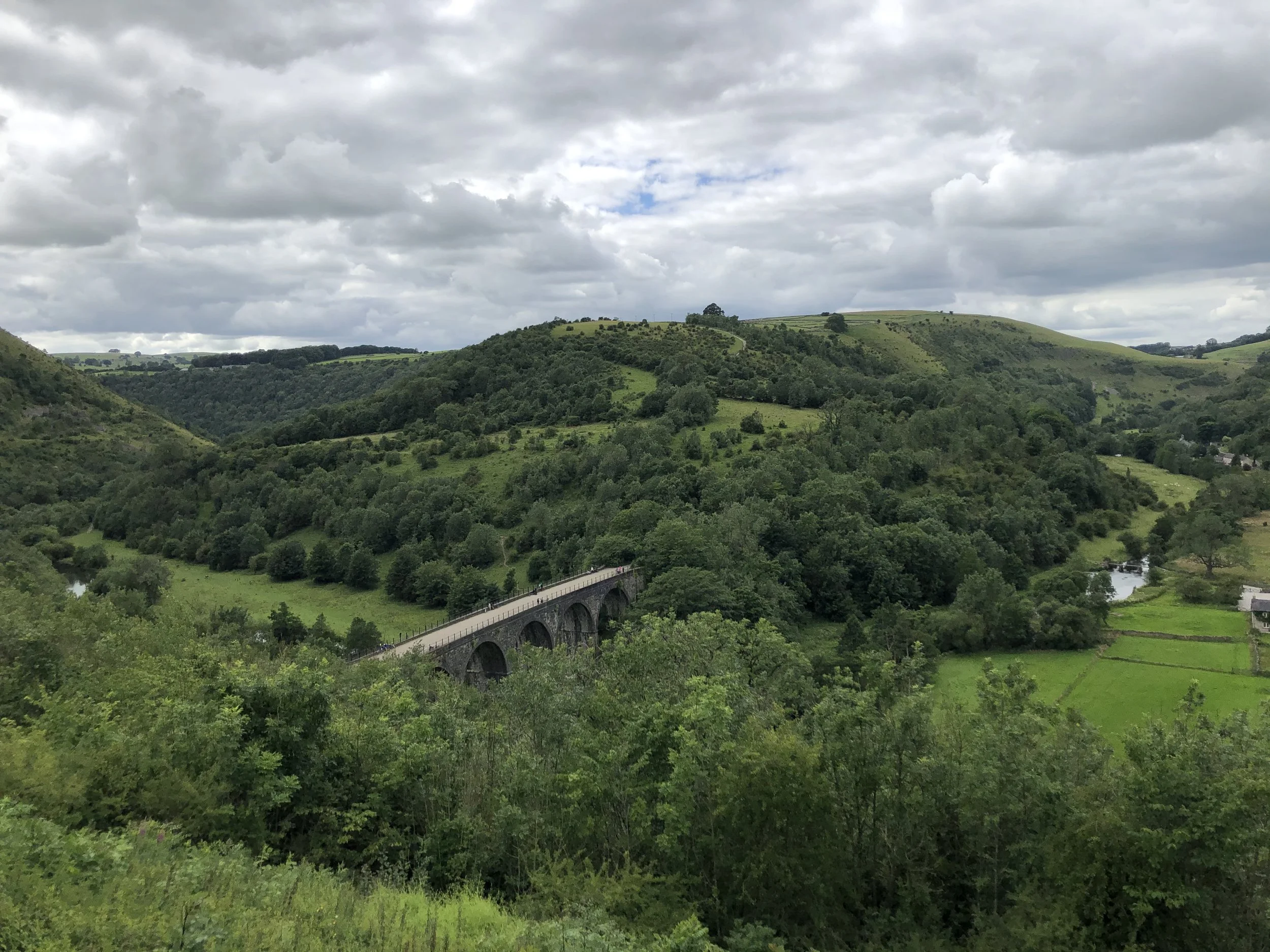 Beautiful view of Monsal Head viewpoint overlooking the Headstone Viaduct, a popular day trip for families staying in Buxton.