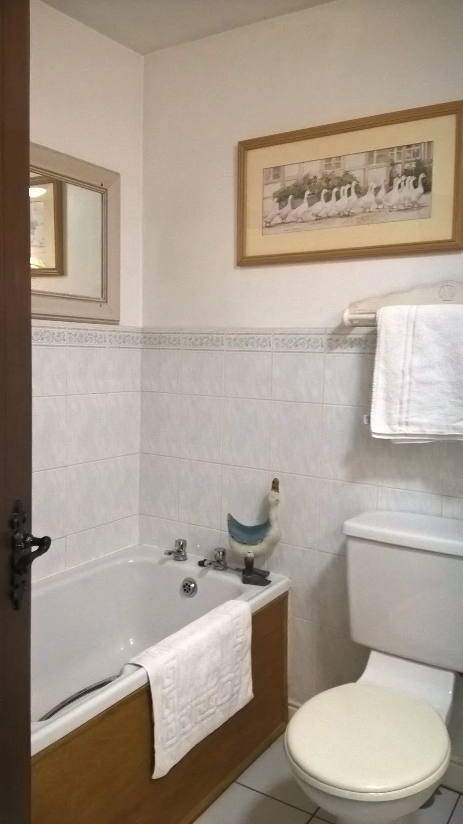 Walk-in wet room, ground floor bathroom, power shower, 3 bathrooms, modern amenities, accessible shower, muddy boots friendly.
Three modern bathrooms including a convenient ground-floor wet room.