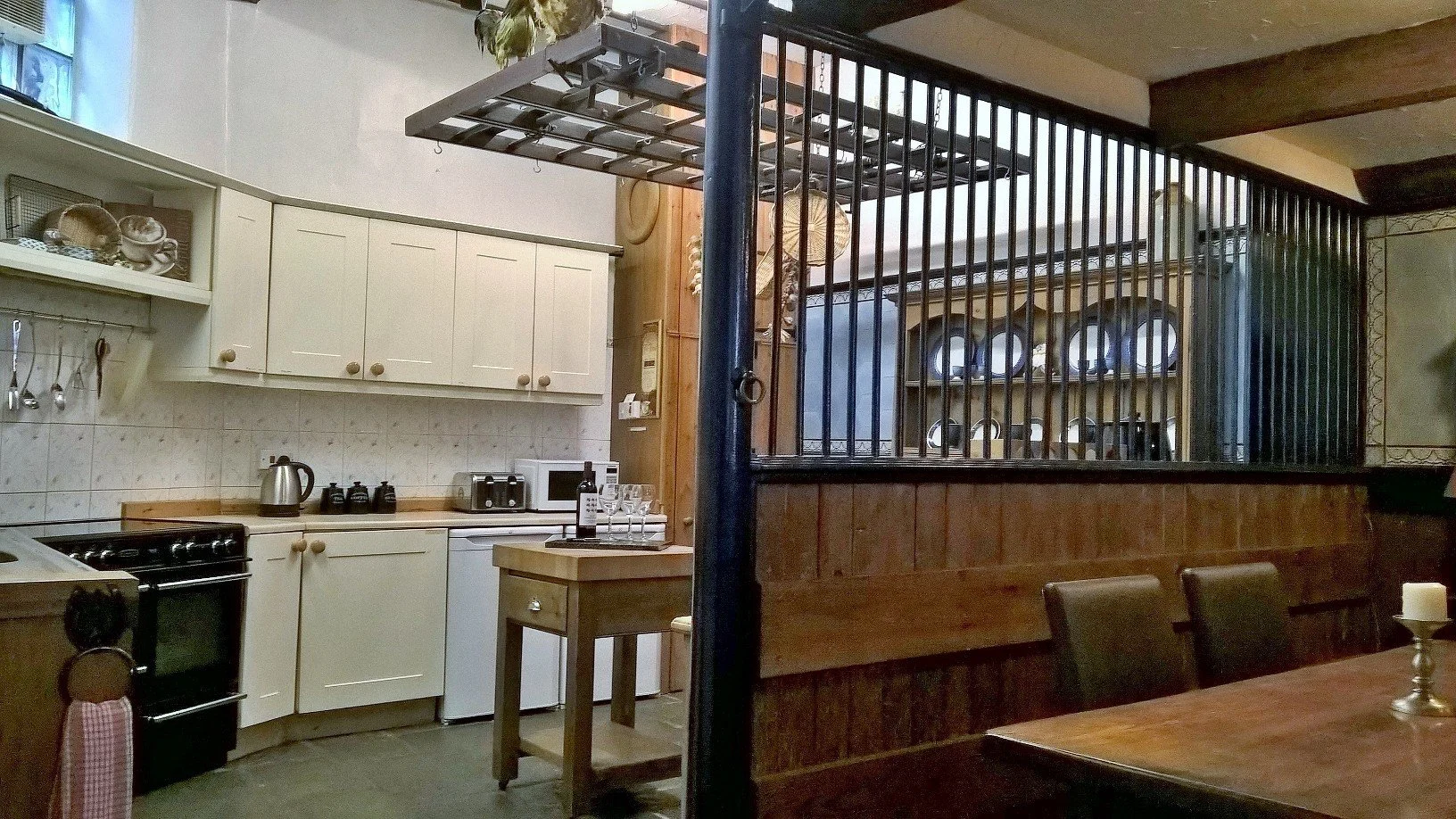 Open-plan kitchen-diner. Unique group dining area for 10 in a converted 18th-century stable.