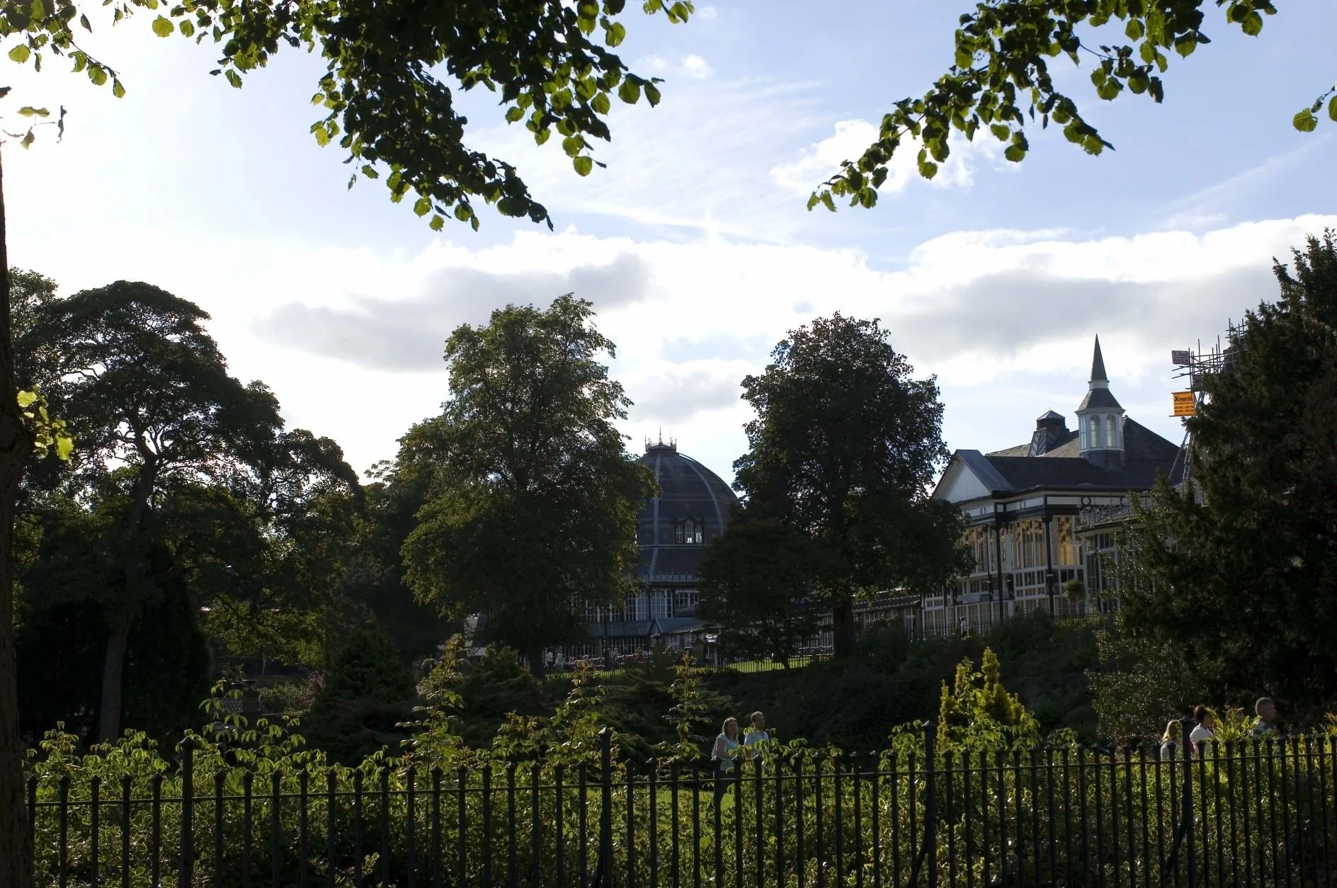 The beautiful Victorian Pavilion Gardens in Buxton, featuring the boating lake and historic Octagon building, located a short walk from our holiday home.