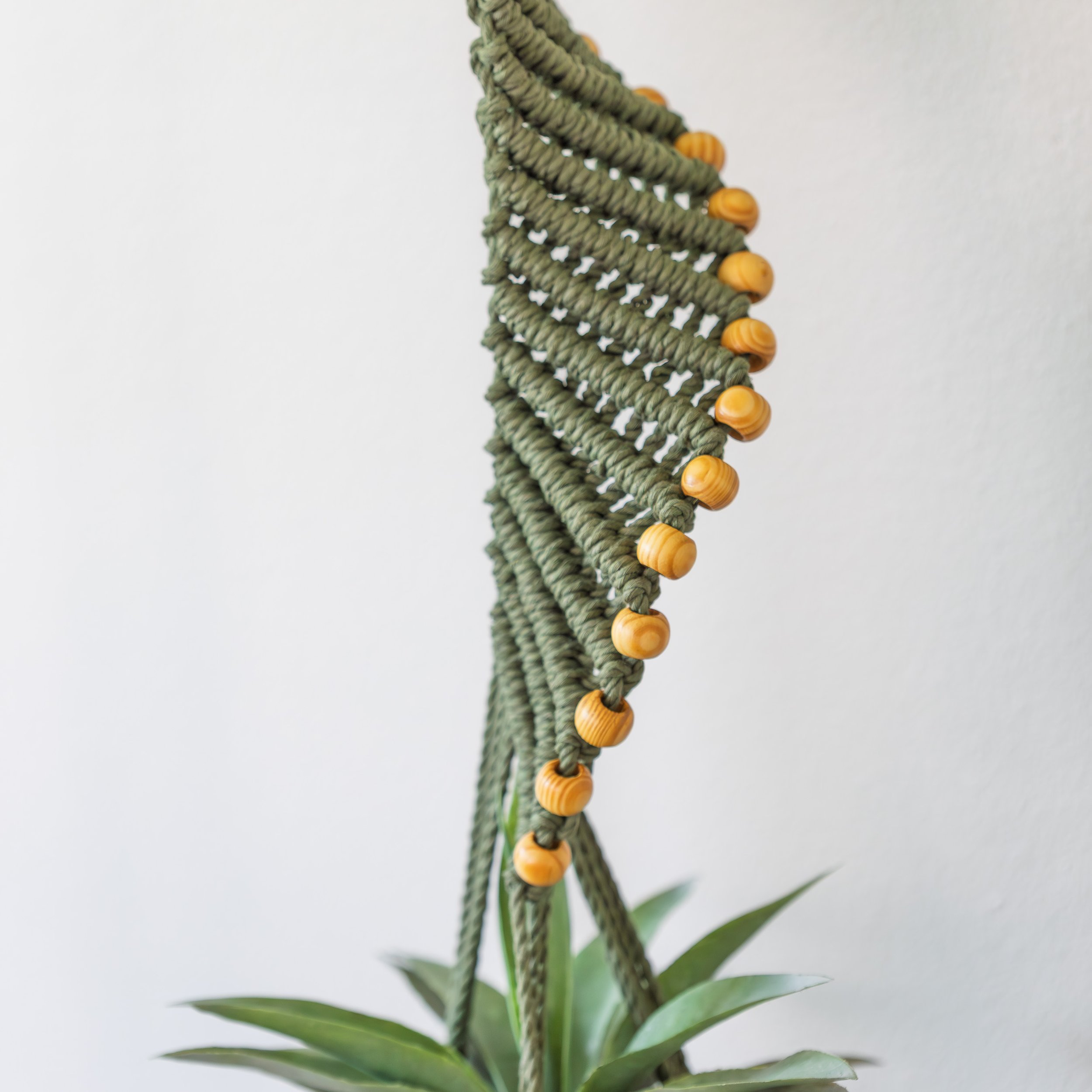 macrame-olive-green-spiral-plant-hanger.jpg
