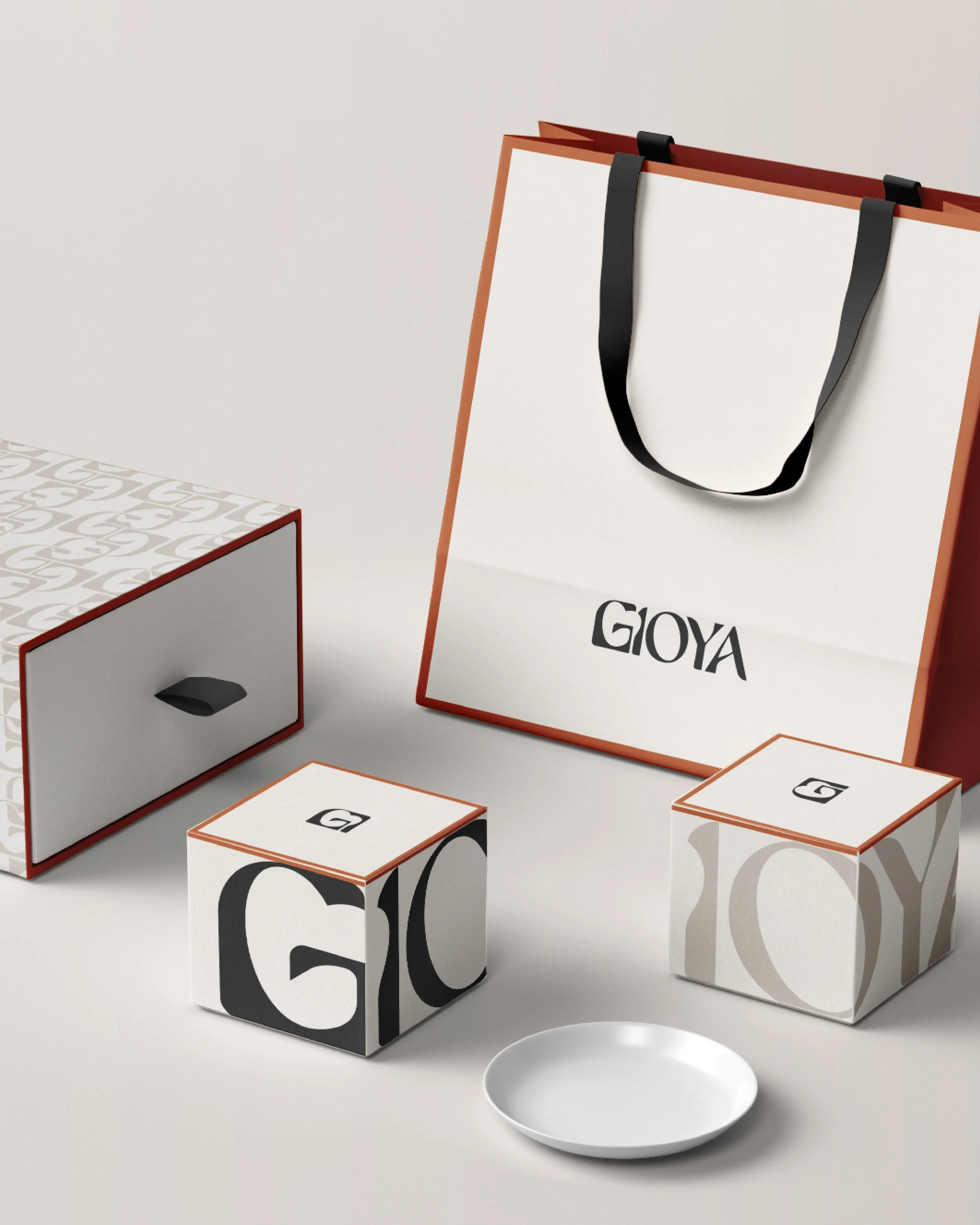 Un ensemble de boîtes créées pour la pâtisserie GIOYA, par Anne-Claire Turbé, designer culinaire