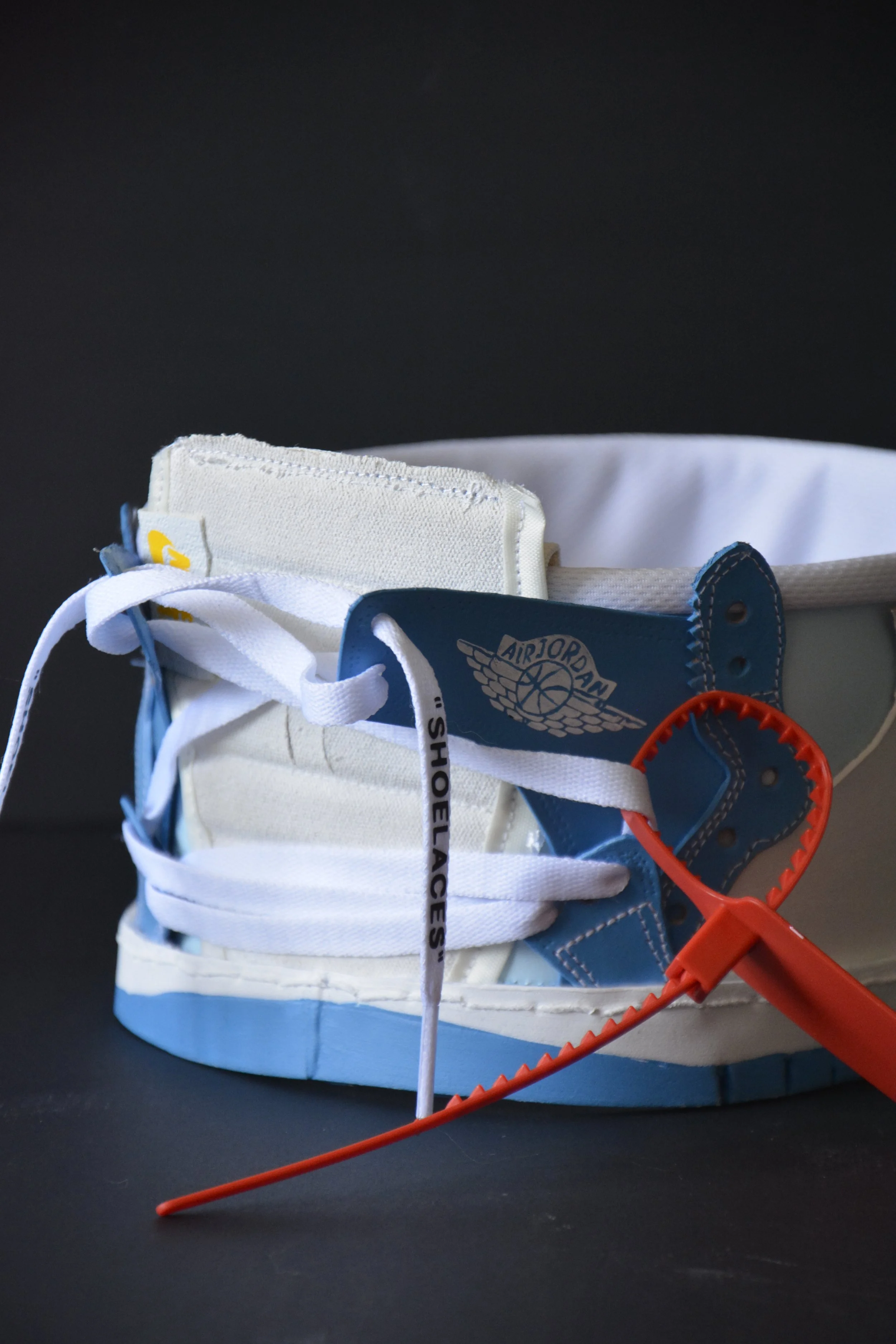 Off-white X nike sneaker crown close up with the red tag