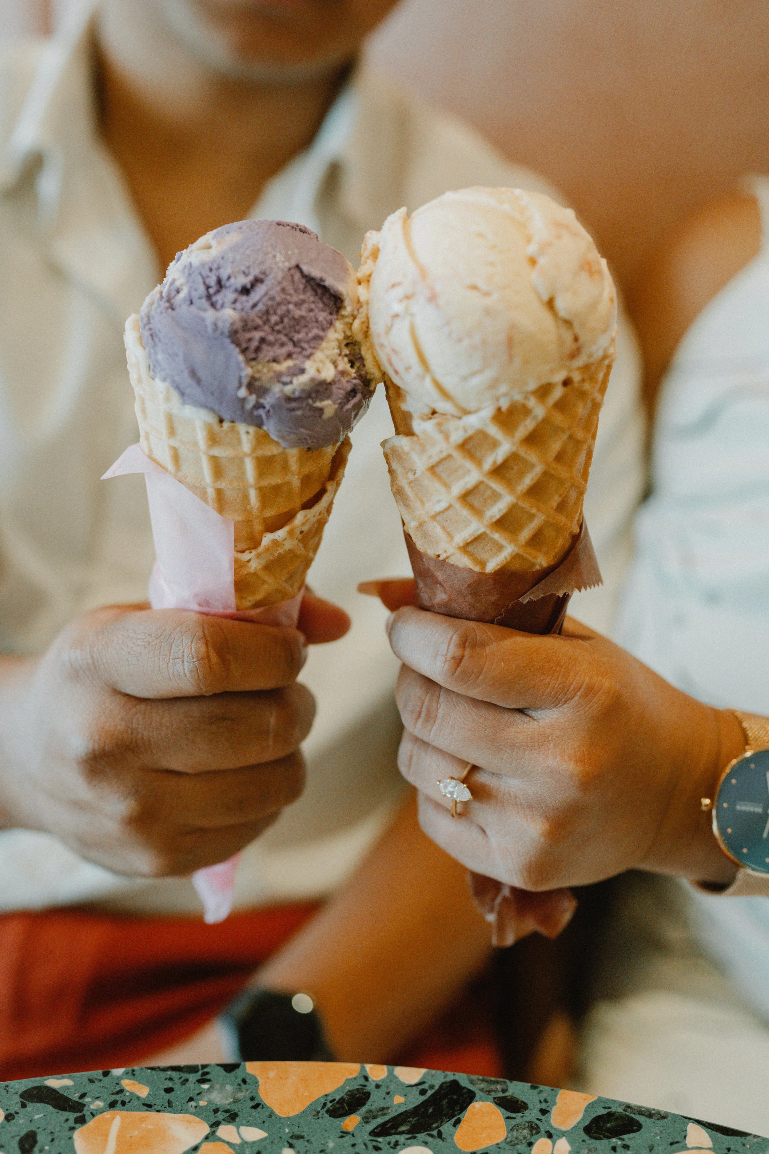 Couple at a Sampaguita Ice Cream catering event, smiling and enjoying ice cream at their celebration