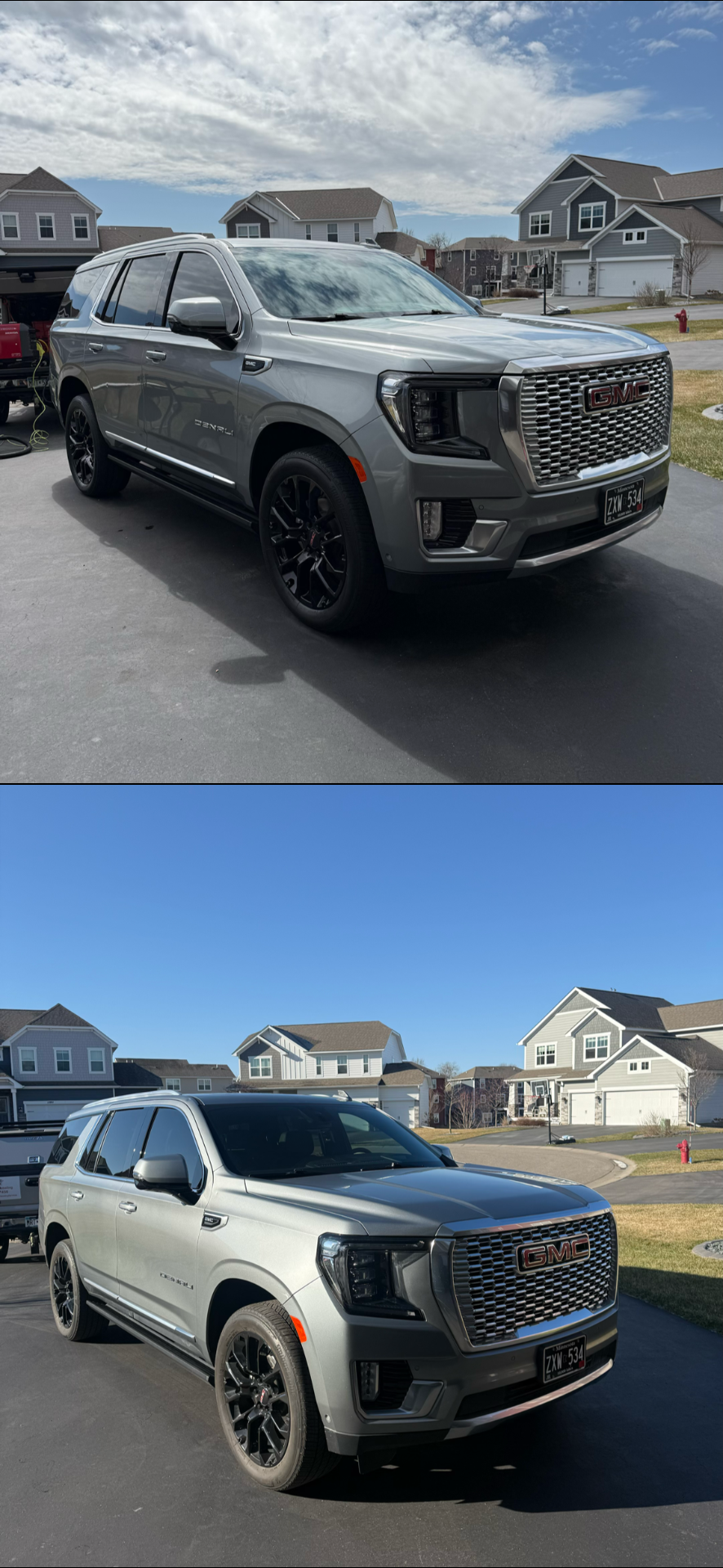 Two GMC Denali SUVs parked in driveways, with houses and a partly cloudy sky in the background.