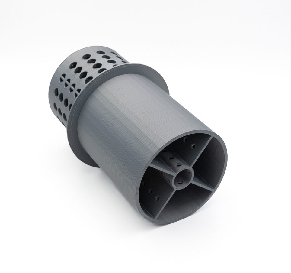 Grey ASA 3D printed cylindrical housing with perforated walls and internal ribs — outdoor-grade FDM part by Printmaker3D, Sollentuna Sweden