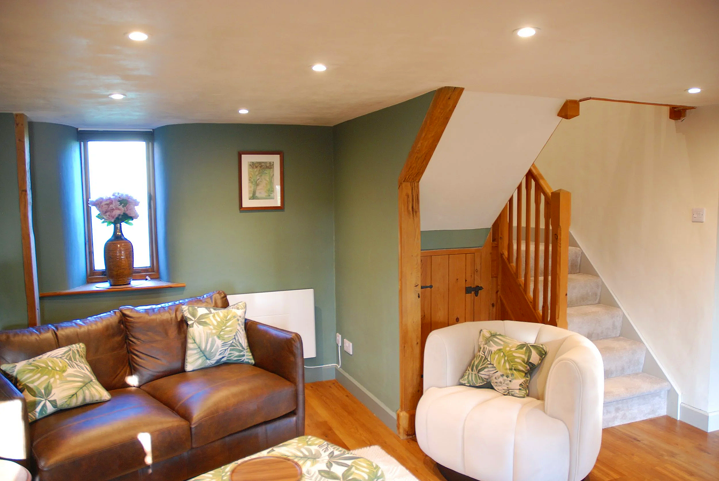 Two seater sofa and separate swivel chair so you can choose to cosy up together or have a seat each.
