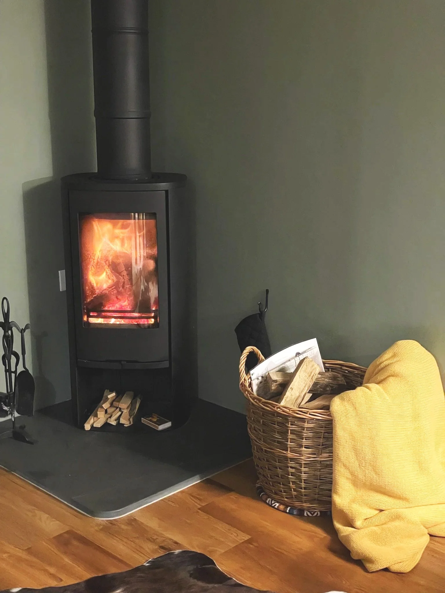 Log burner with full basket of logs to warm up those chilly evenings