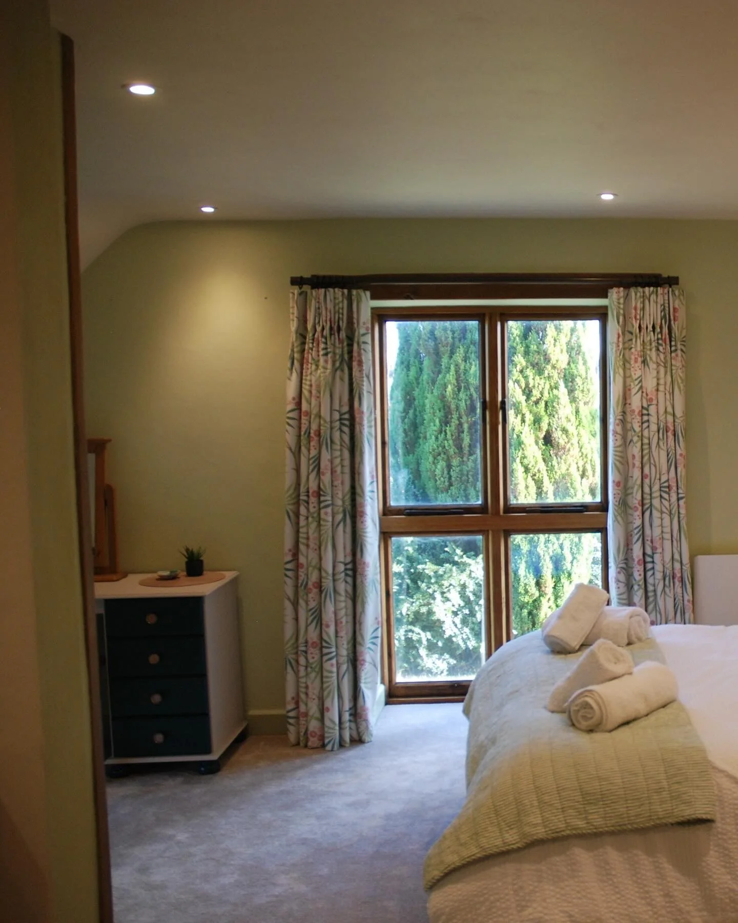 Large windows for enjoying the countryside from your bed