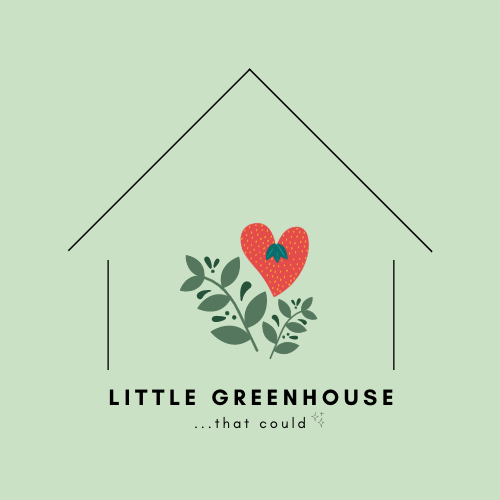 A green background with a simple house outline frame, a heart-shaped strawberry plant in the center, and black text that says "LITTLE GREENHOUSE ...that could".