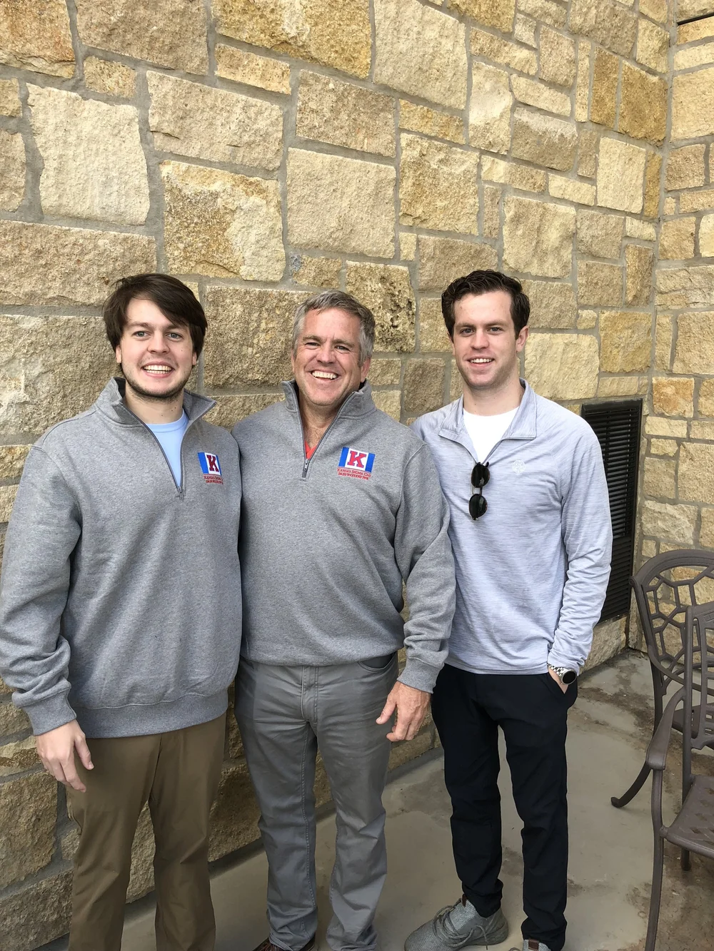 Daniel McLiney, Kevin McLiney Sr, and Kevin McLiney Jr of Fortress Floors KC, from left to right