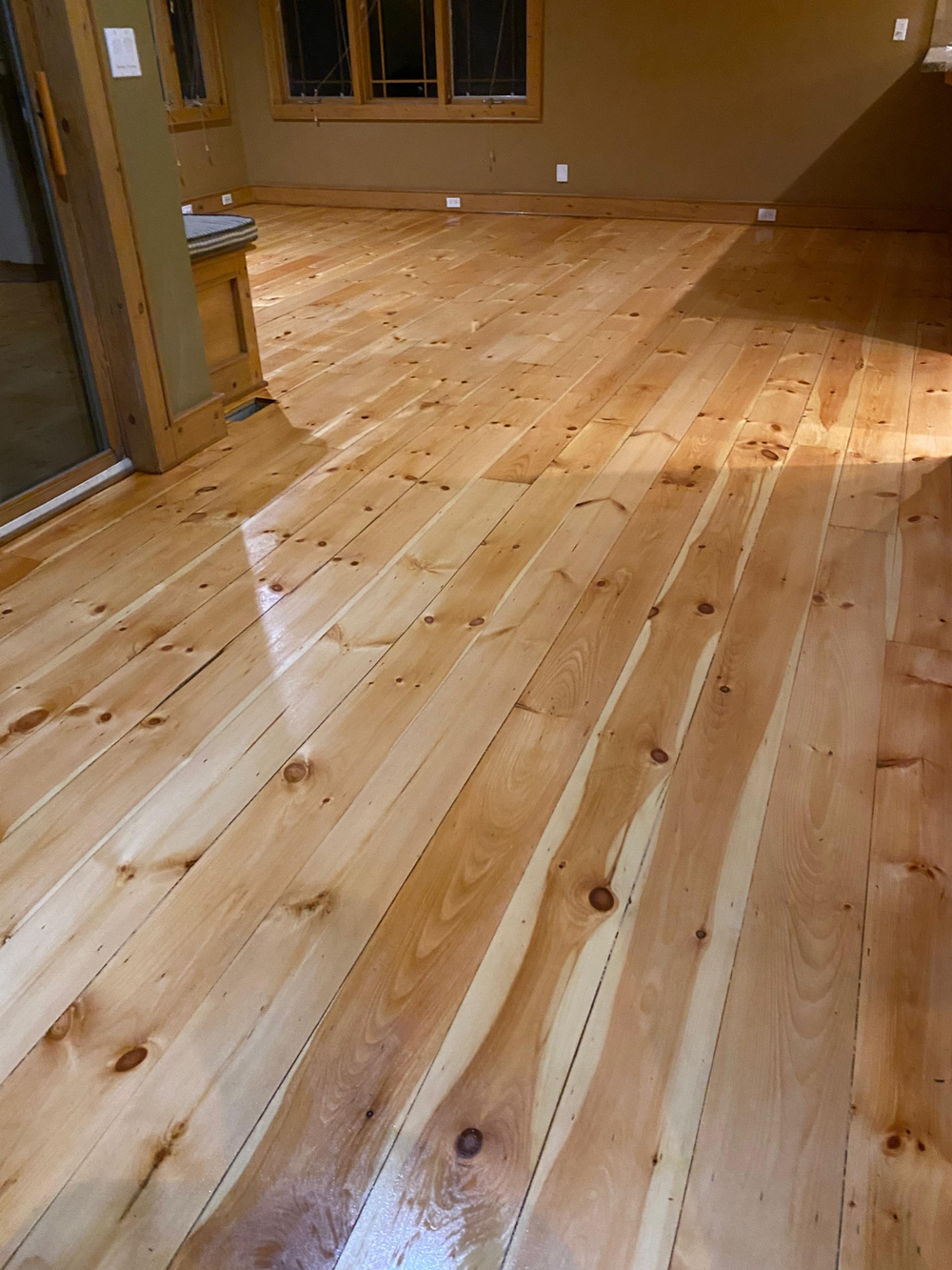 Natural-finish hardwood with visible knots in a Kansas City home