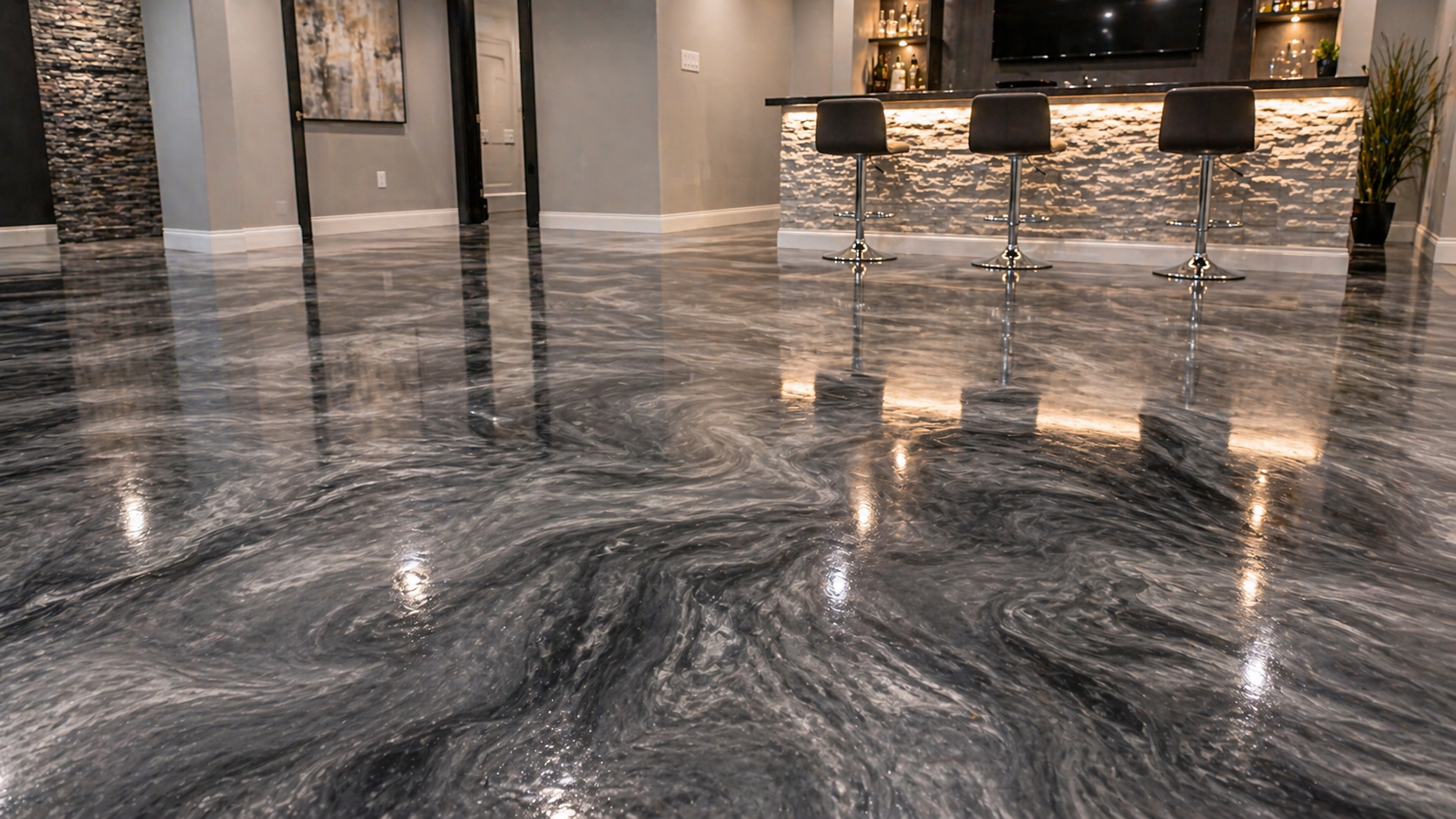 Decorative metallic epoxy floor coating with marbled finish in Kansas City basement