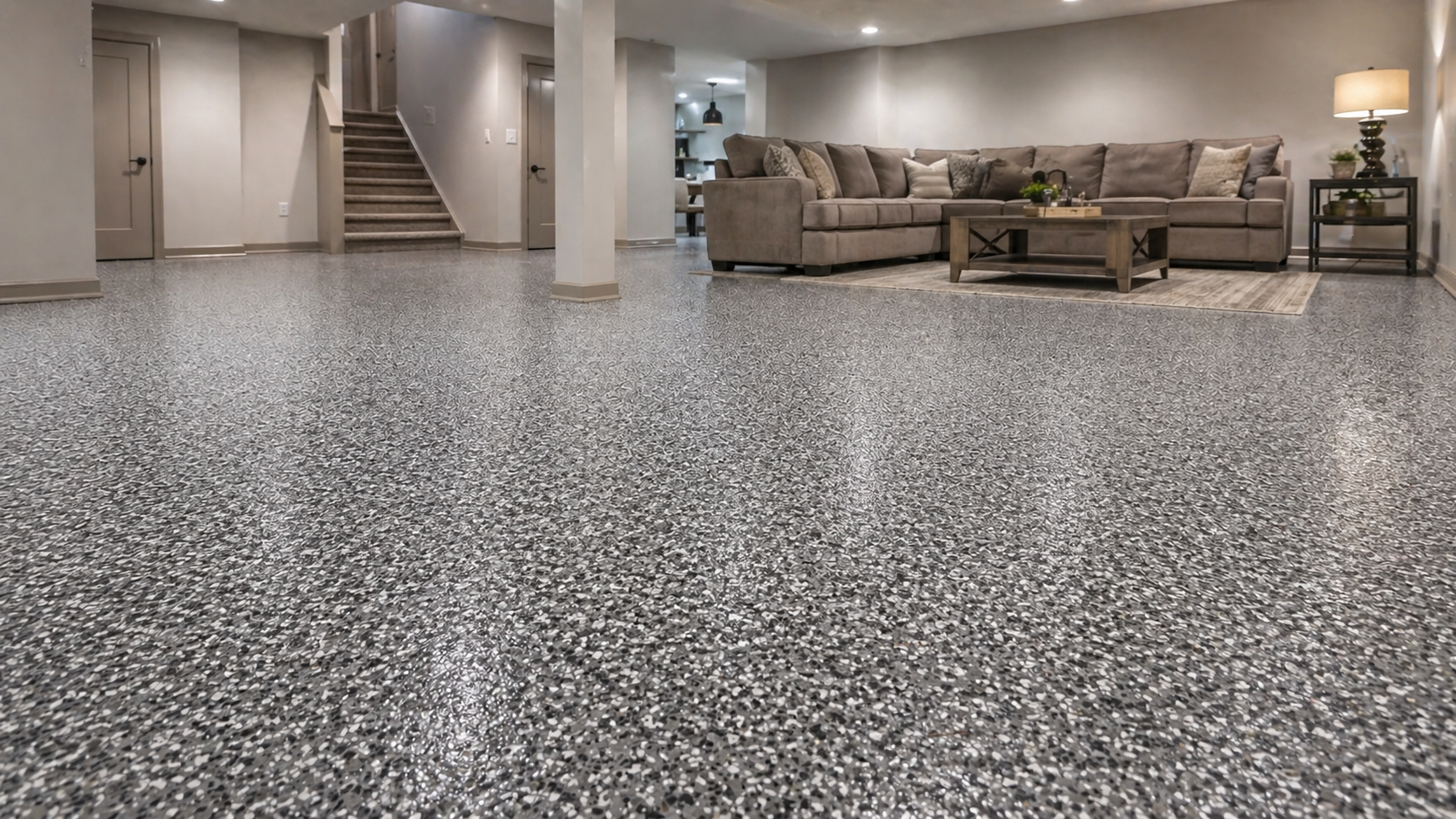Finished basement with gray flake concrete floor coating in Kansas City home