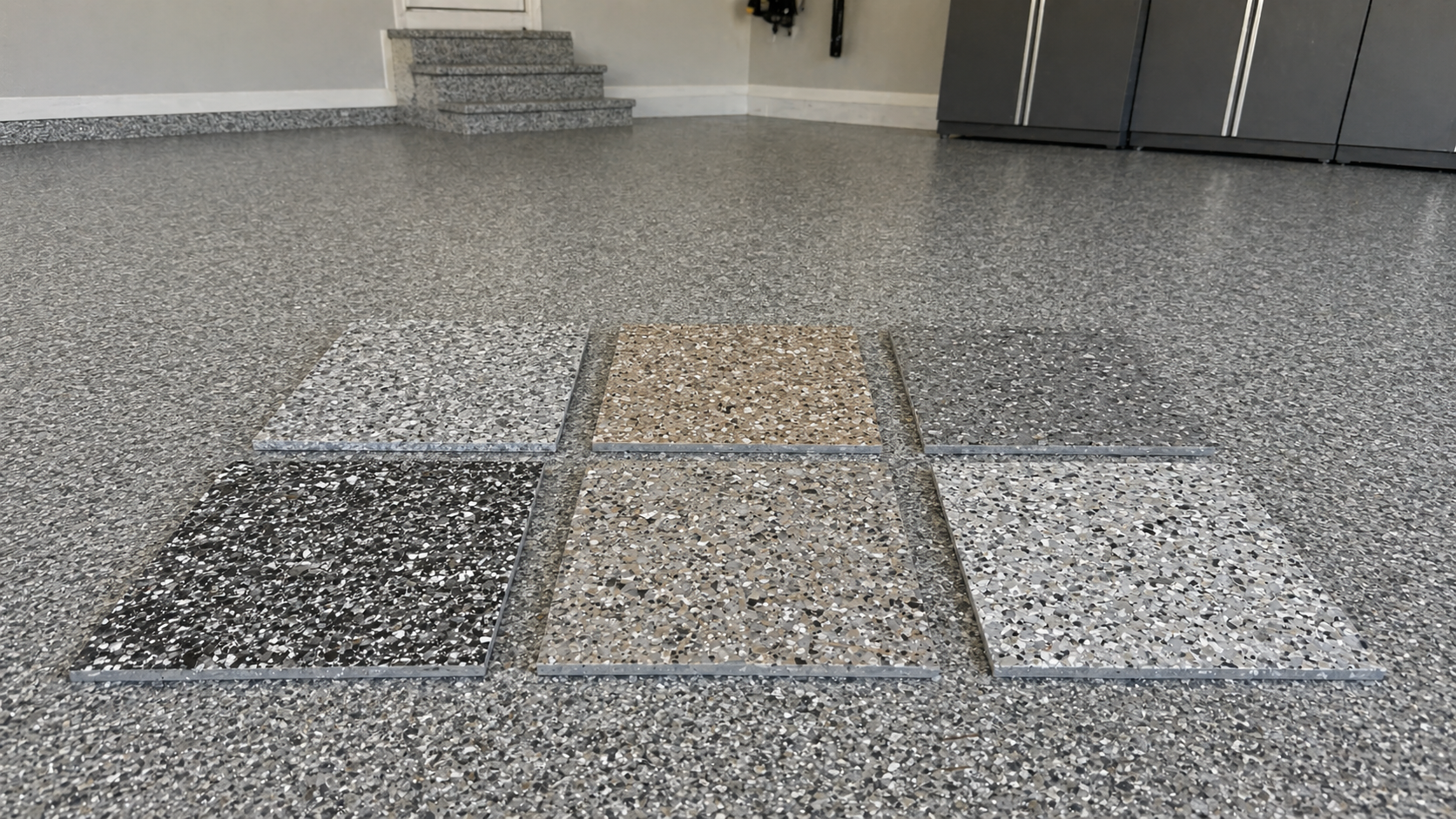 Concrete coating flake color samples including gray, tan, and charcoal blends