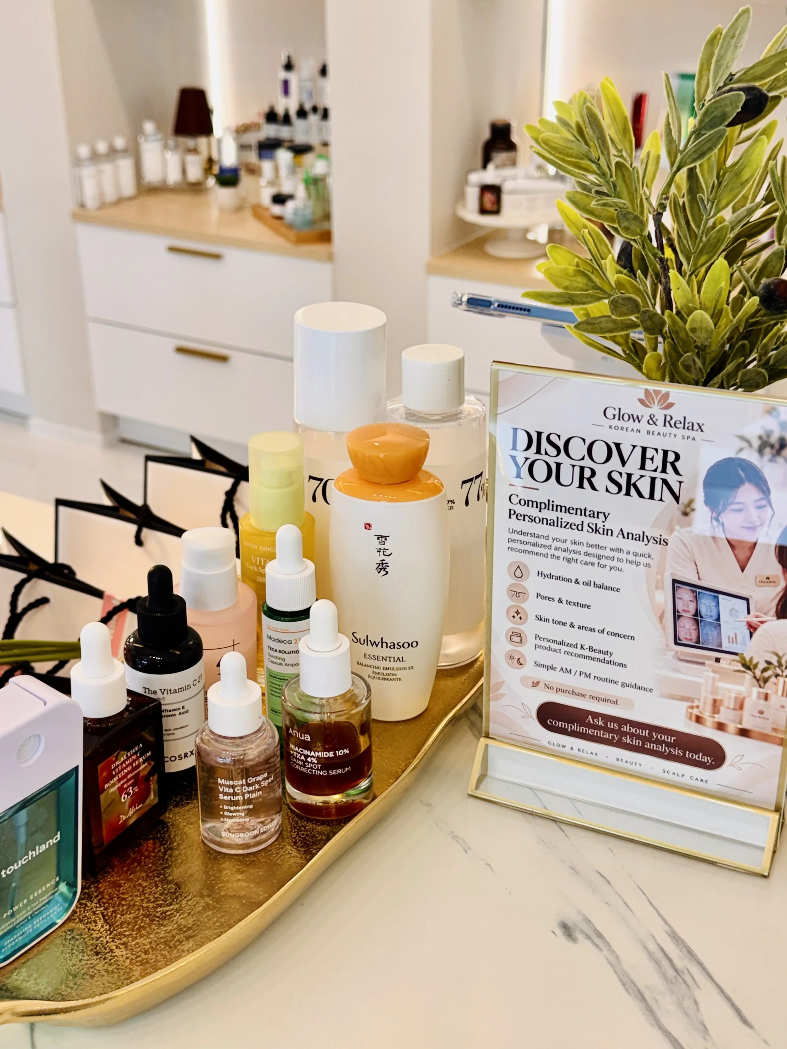 A skincare product display with a printed information card