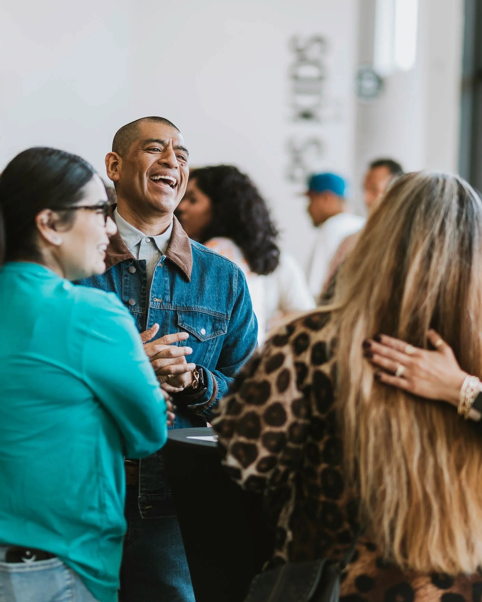 Members connecting in the lobby after a Sunday service at Pearl Street Church
