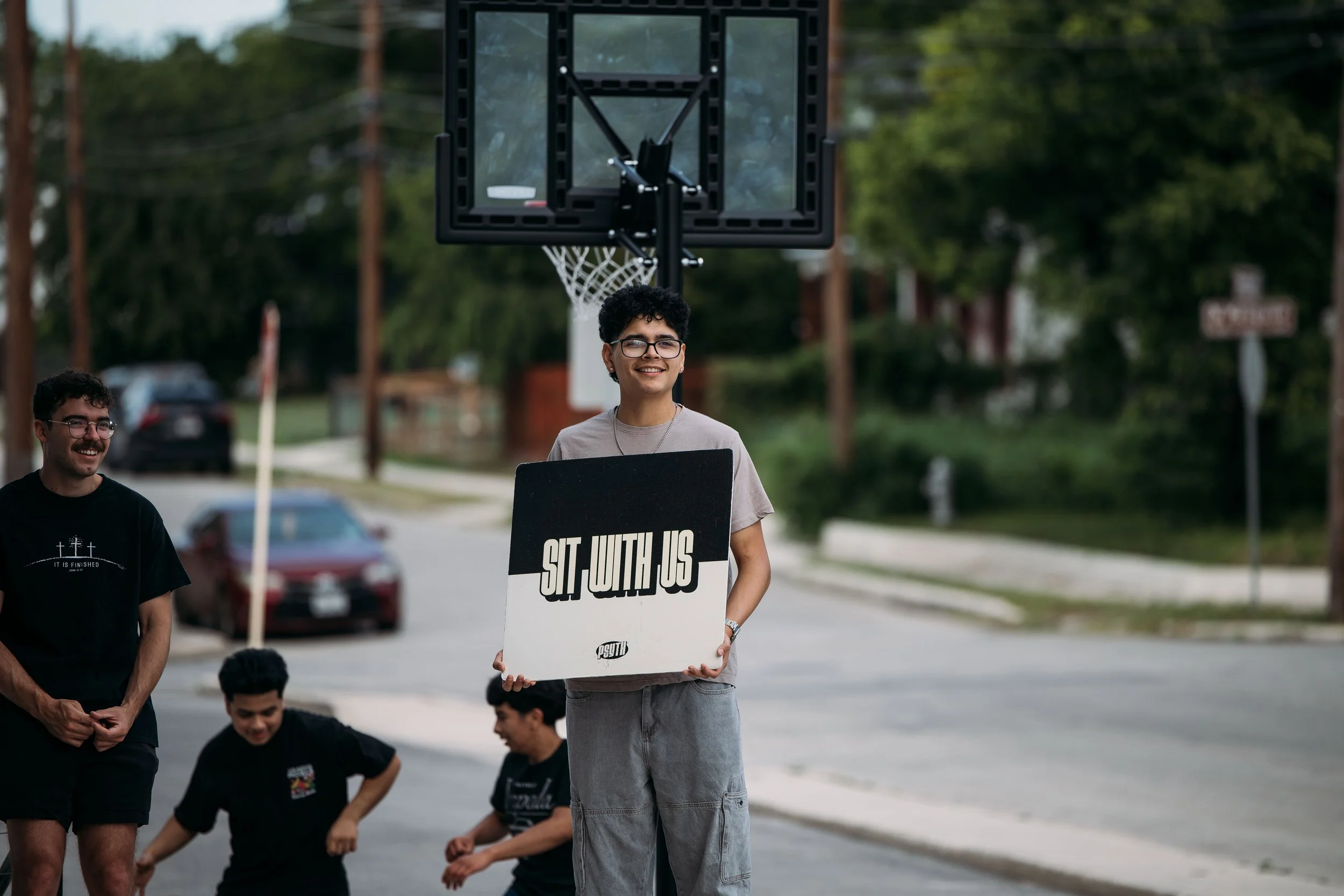 PSYTH students at a neighborhood basketball court during a Pearl Street Church serve day