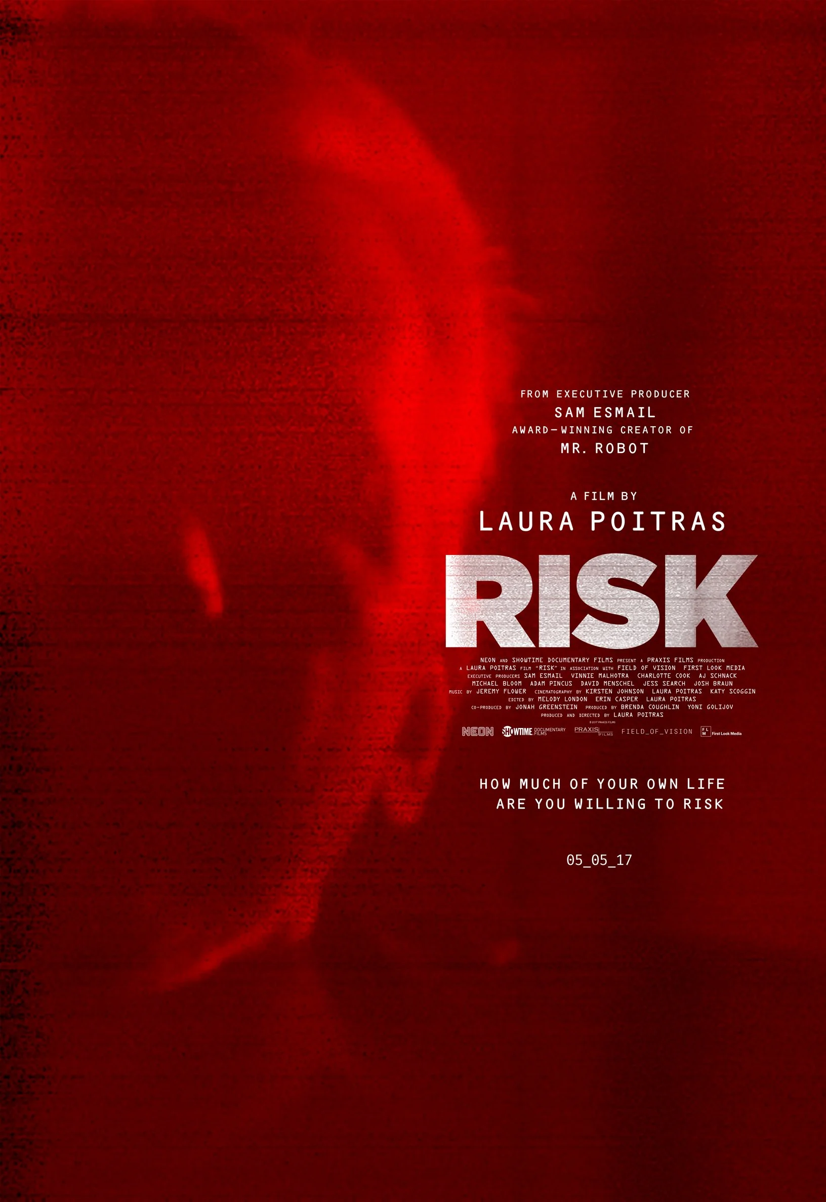 Film poster for 'Risk' directed by Laura Poitras, featuring a silhoutte of Wikileaks founder Julian Assange, in bold red and black colors, with the title 'RISK' in large silver letters.