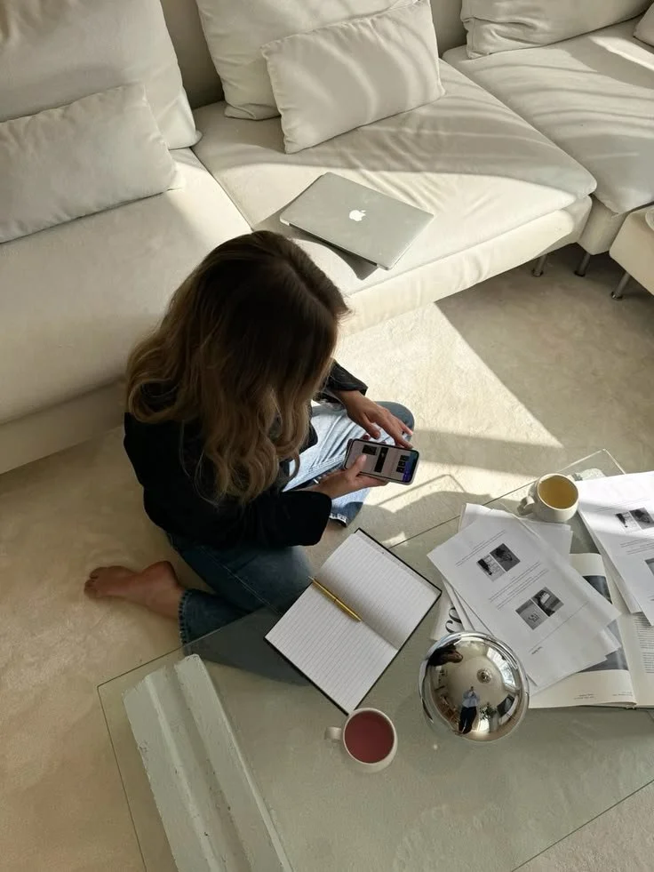 Web designer working on Squarespace branding and design materials in a Los Angeles studio