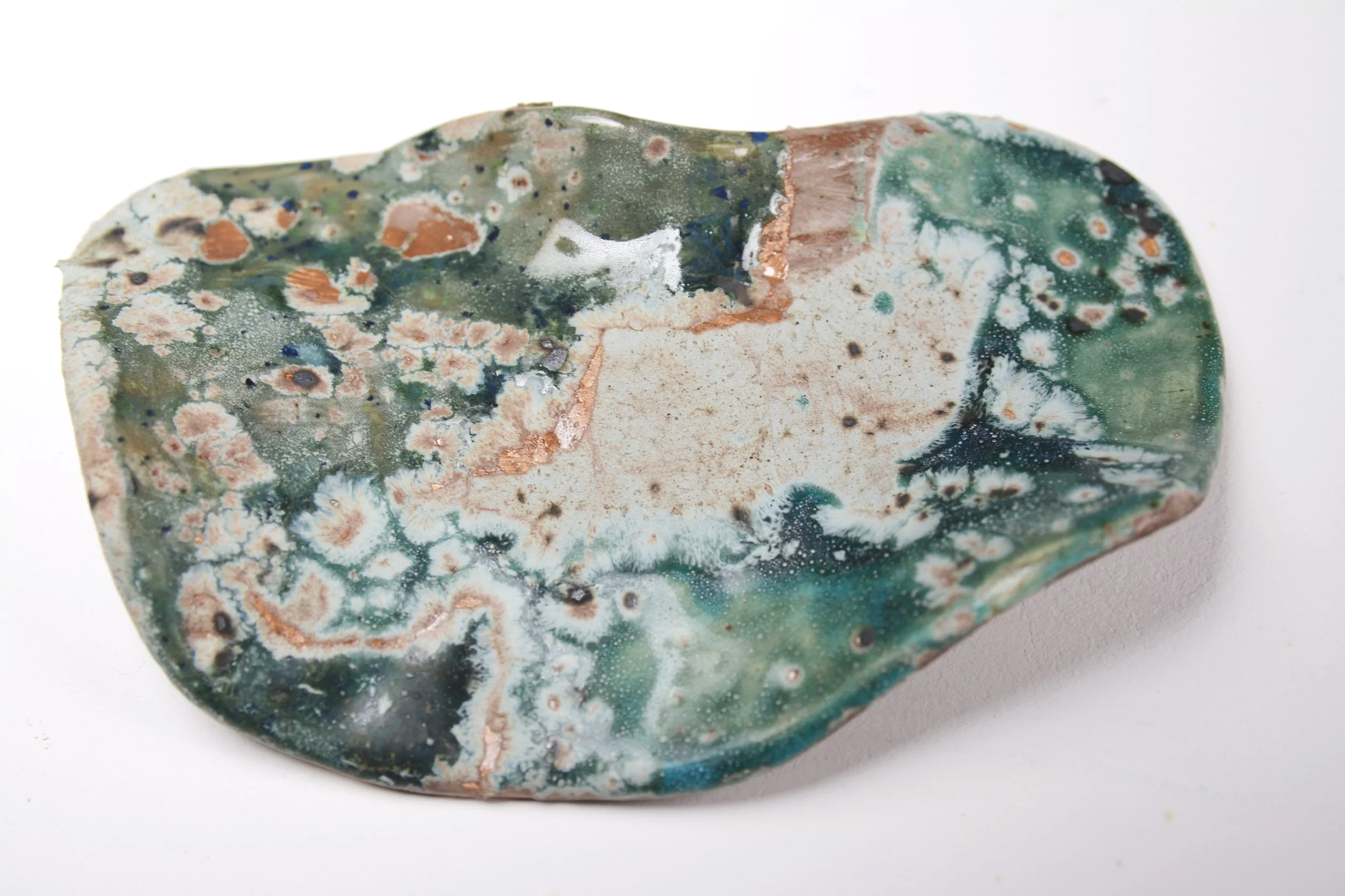 Organic Form 3
Size: 10 × 12cm
Material: Hand‑built ceramic (Porcelain clay),  mix layered glazes
Year: 2025