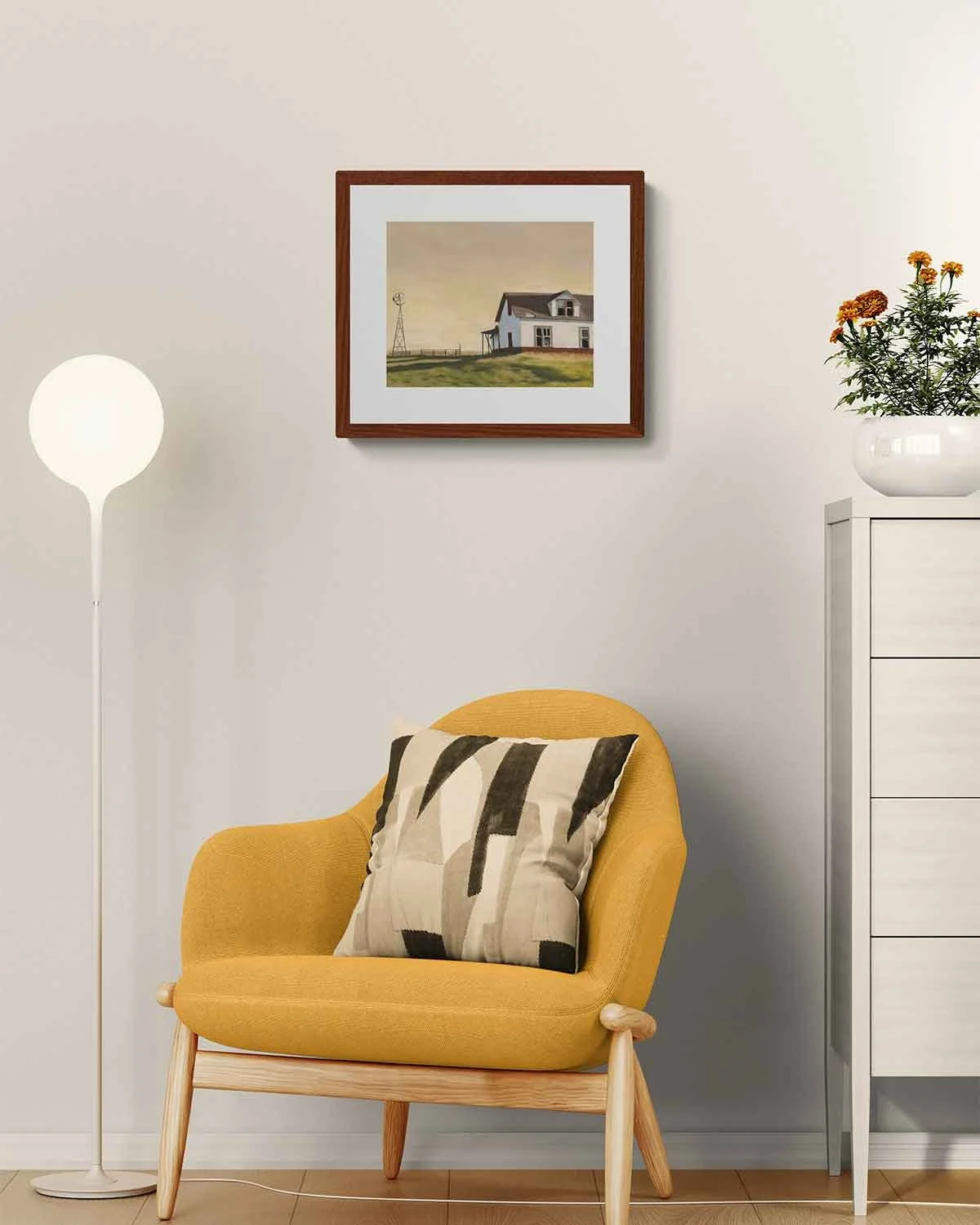 A framed oil pastel painting of an abandoned house in a field.