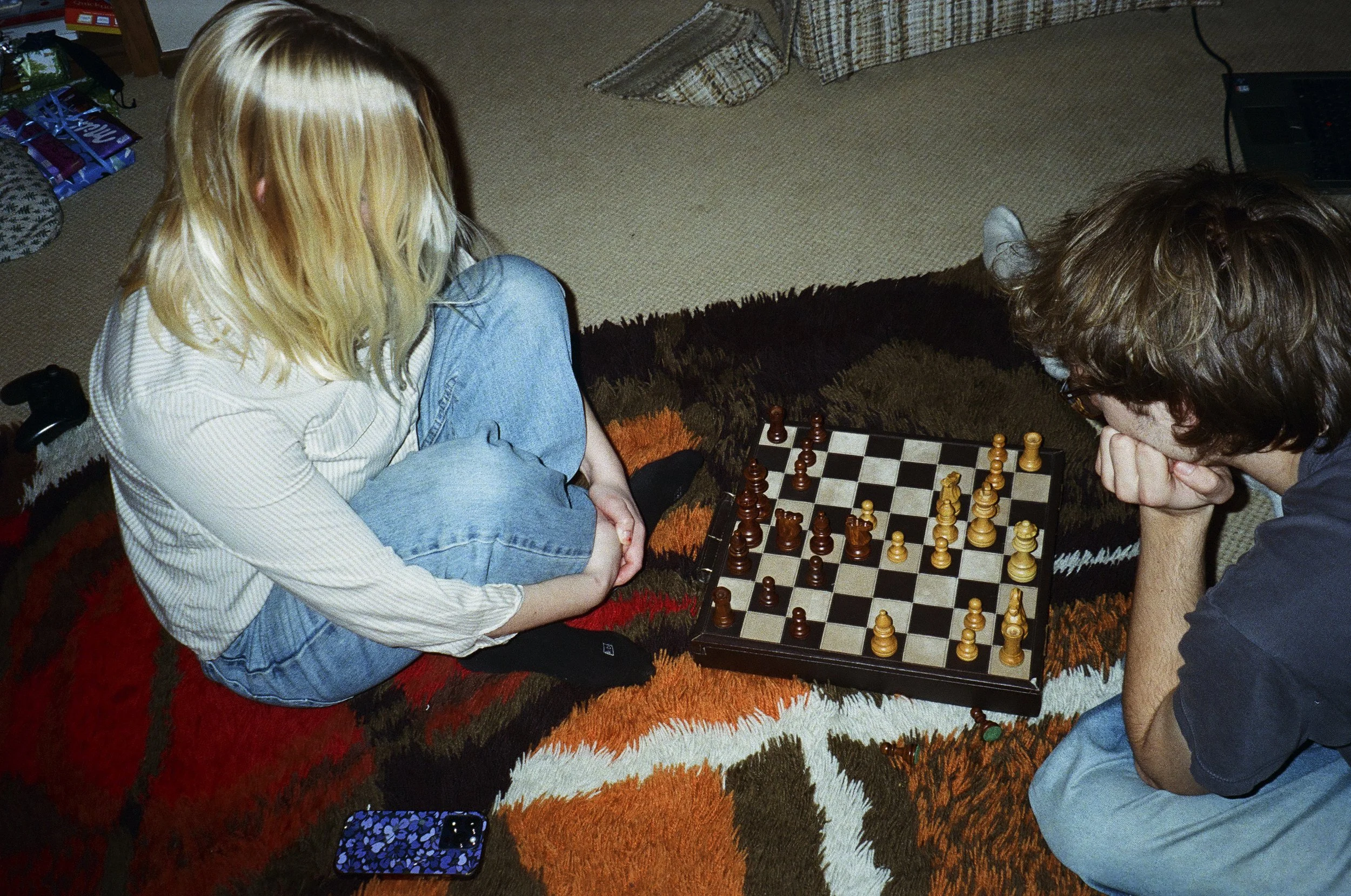 "Evenly Matched", Dear Friends Play Chess at Everett's Lincoln City Beach House - New Years Eve 2025, Kodak Portra 400
