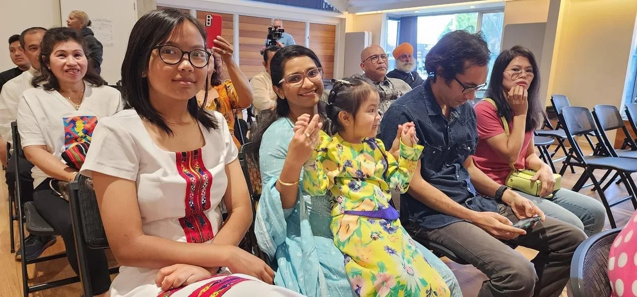 Audience enjoying IFAD performance.