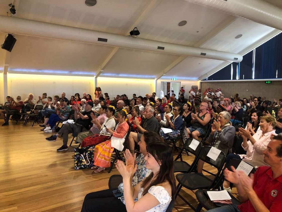 Audience enjoying performances at the International Food and Dance Festival.
