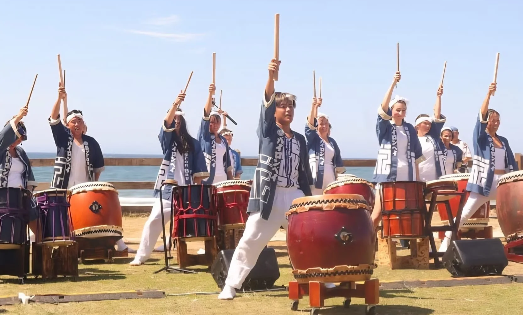 Group of performers dancing at the International Food and Dance Festival.