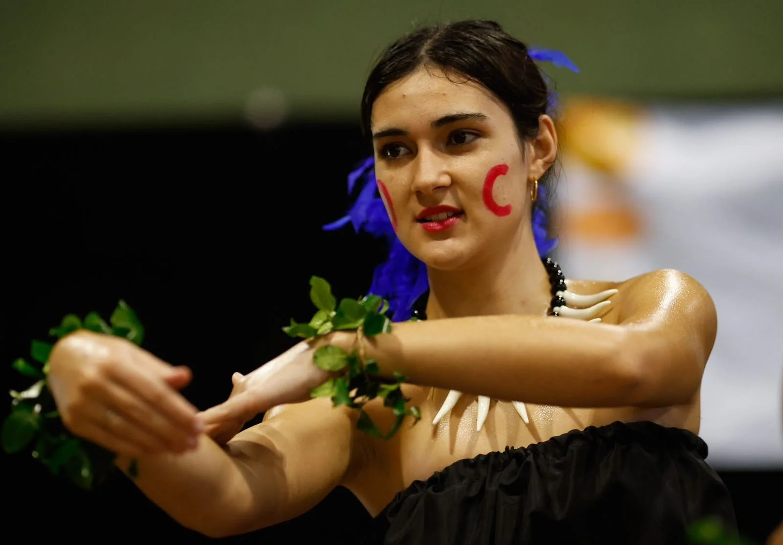 A performer dancing at the International Food and Dance Festival