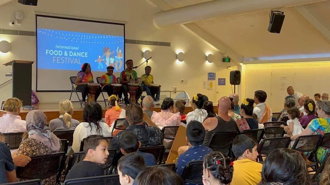 Audience enjoying IFAD performances
