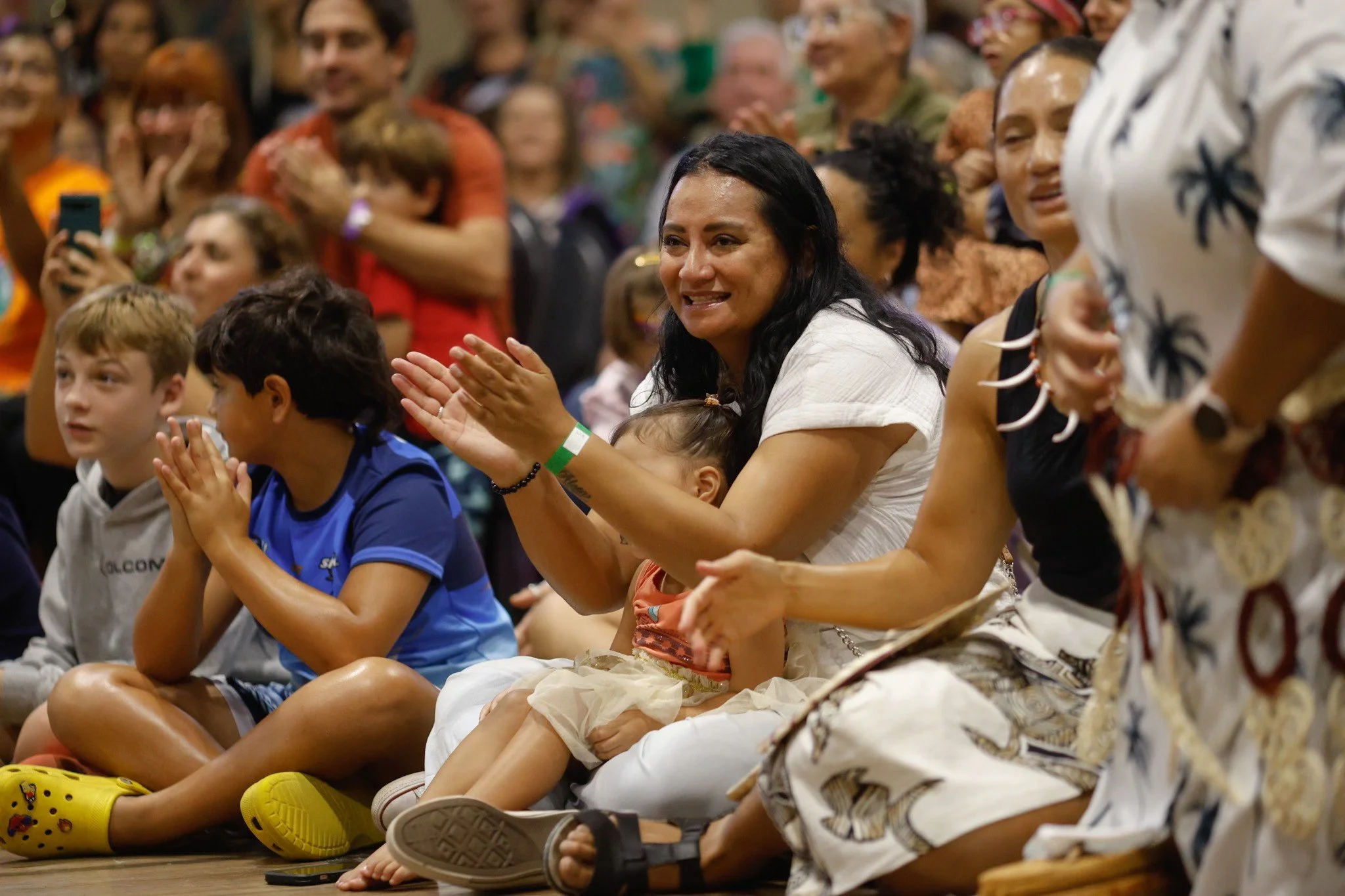 Audience enjoying International Food and Dance performances.