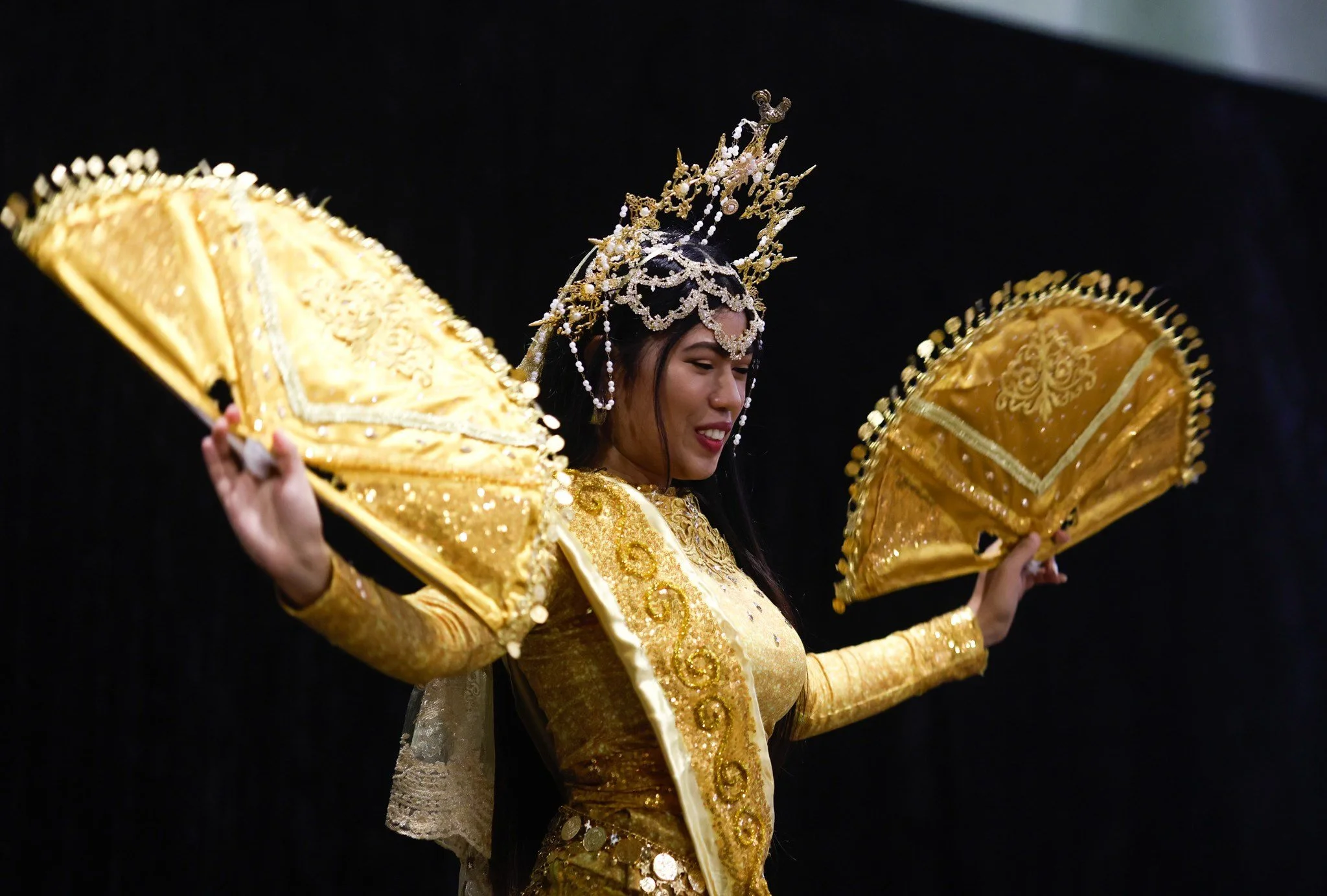 A performer dancing at the International Food and Dance Festival.