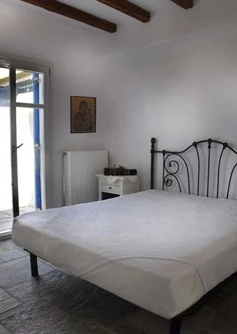 Rest and relax in the primary bedroom with queen bed