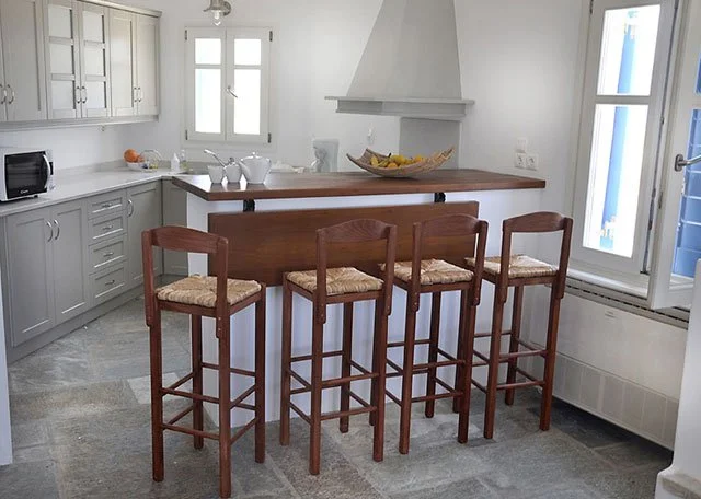 Enjoy cooking and conversation in the fully equipped kitchen