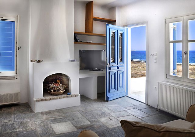 Relax in the cozy living room listening to the Aegean waves