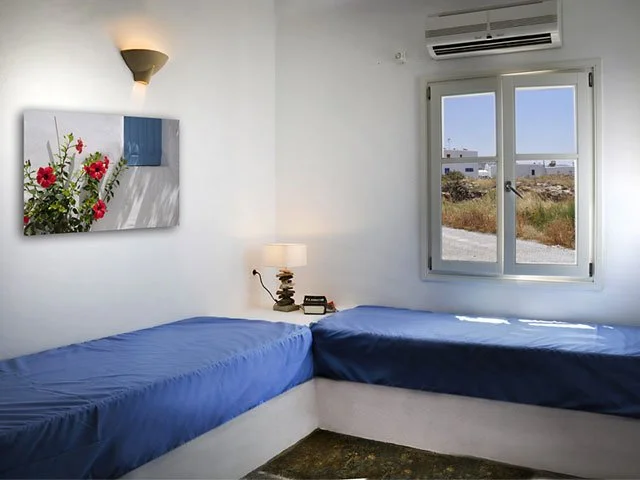 Rest in the second bedroom as the sun drifts by and cares melt away