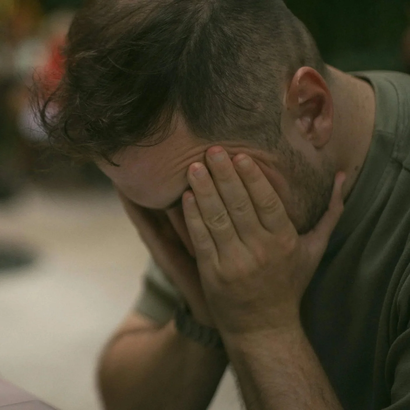 Overwhelmed professional man dealing with chronic work stress and mental pressure at work