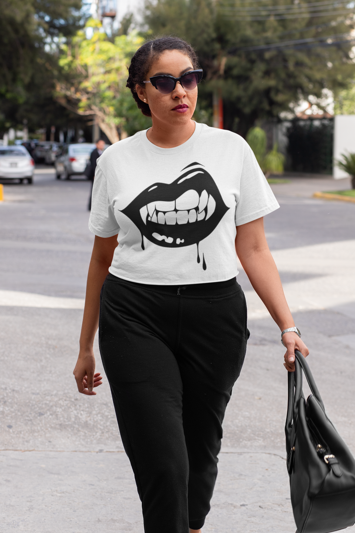 crop-top-mockup-of-a-woman-with-an-athleisure-look-walking-down-the-street-32435a.png
