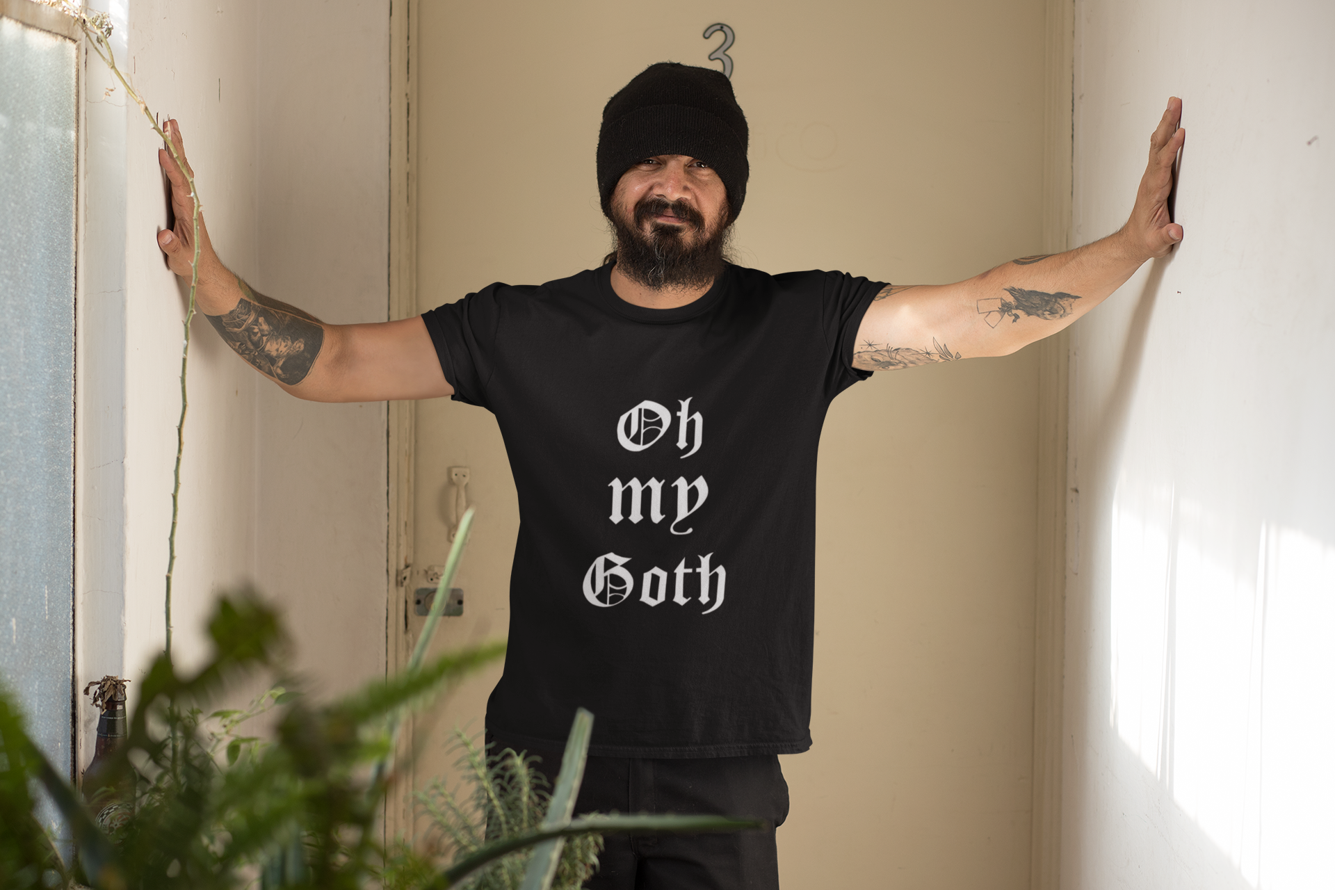 mockup-of-a-tattooed-man-wearing-a-t-shirt-indoors-32833.png